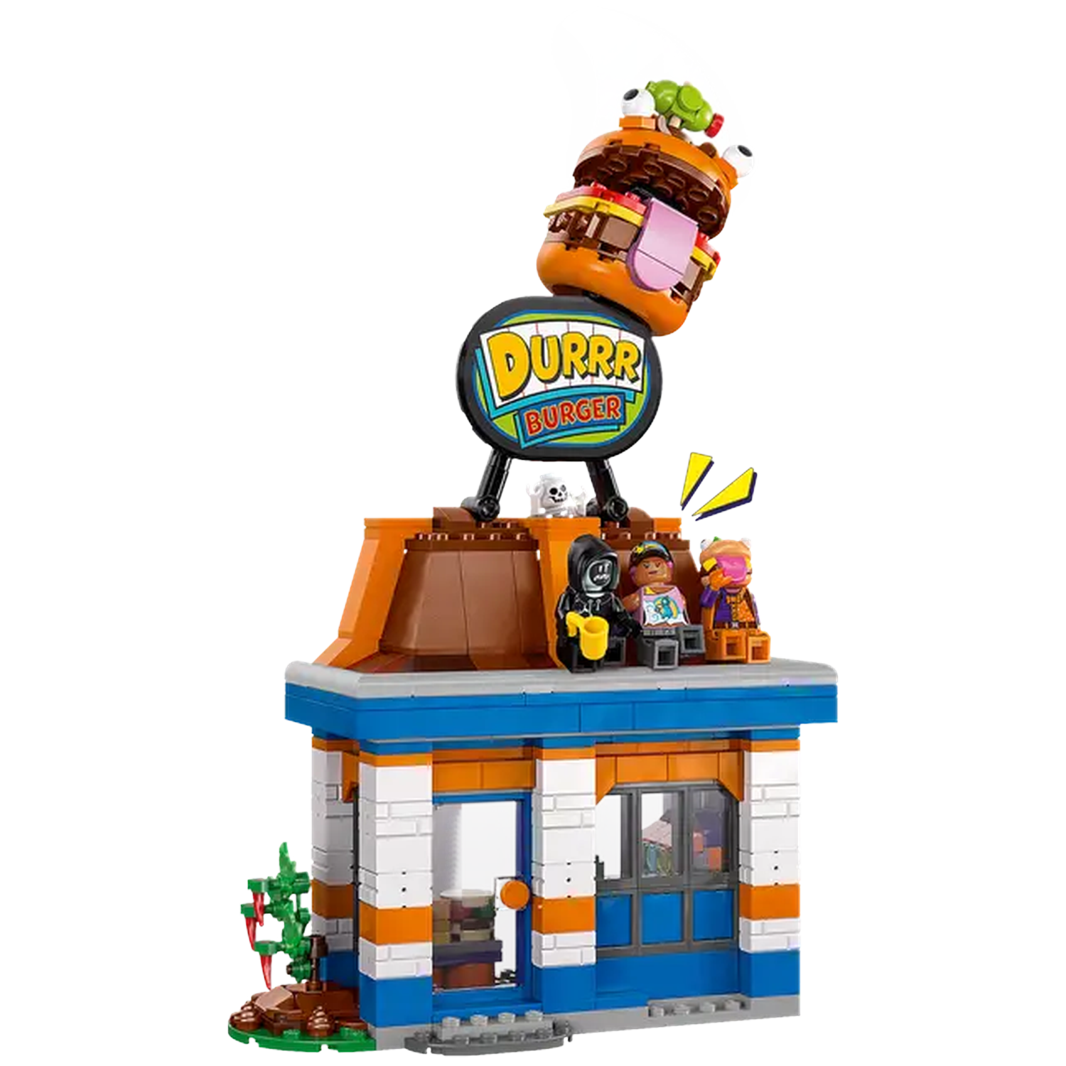 Lego Durrr Burger restaurant met een gigantisch hamburgerbord en figuren van mensen op het dak. Een kleine plant vooraan.
