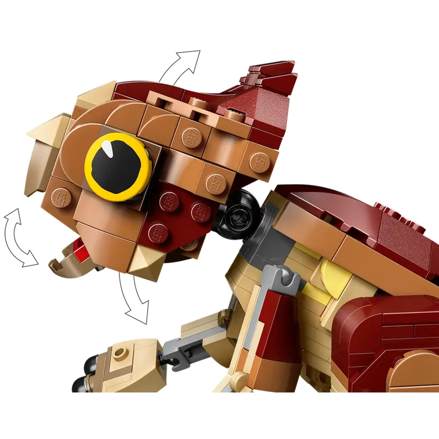 A Lego creature with a large eye, tan and maroon colors. The head is raised with arrows indicating movement.
