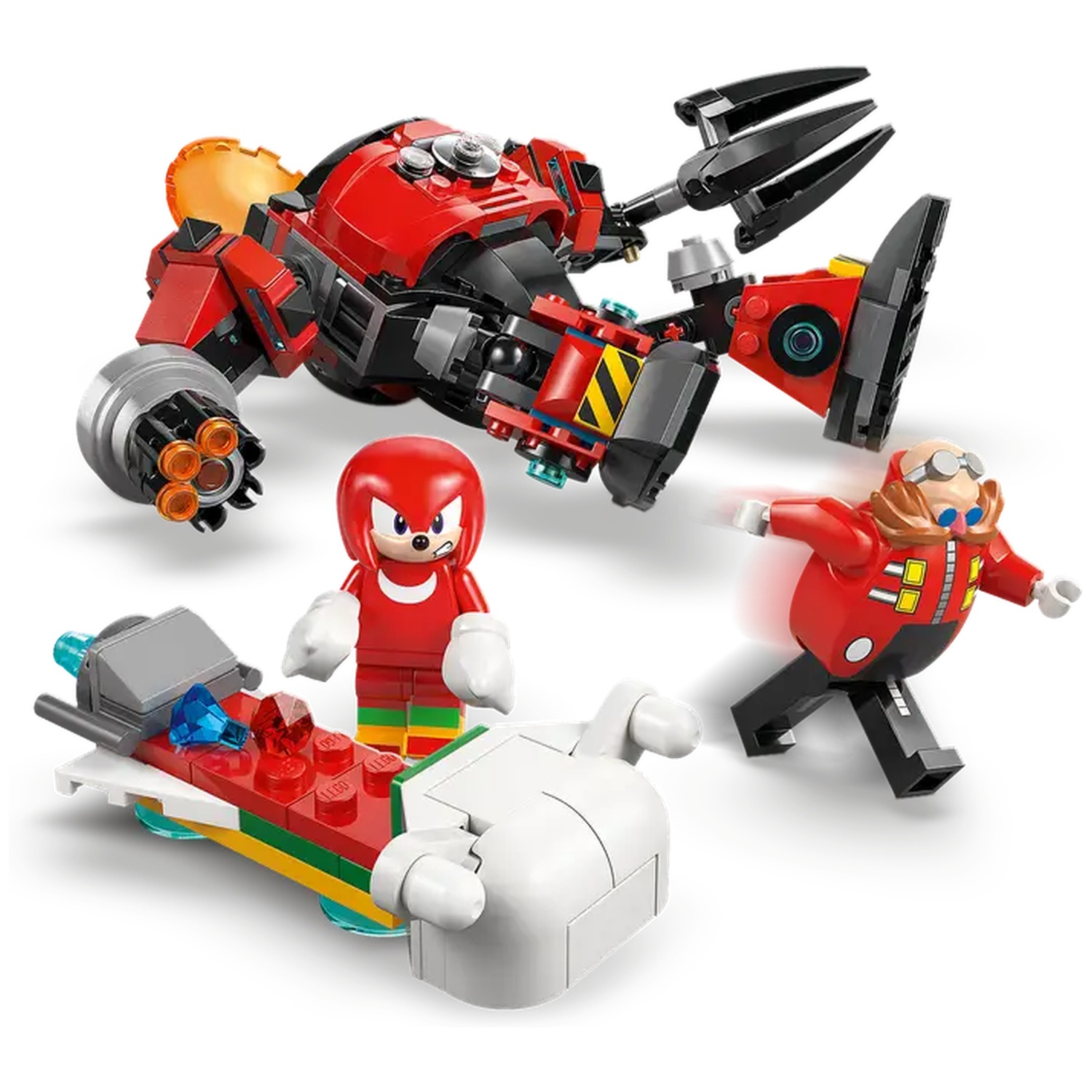 Ensemble Lego avec robot rouge, Knuckles, Eggman et un petit véhicule. Les personnages sont en poses d'action, fond blanc.