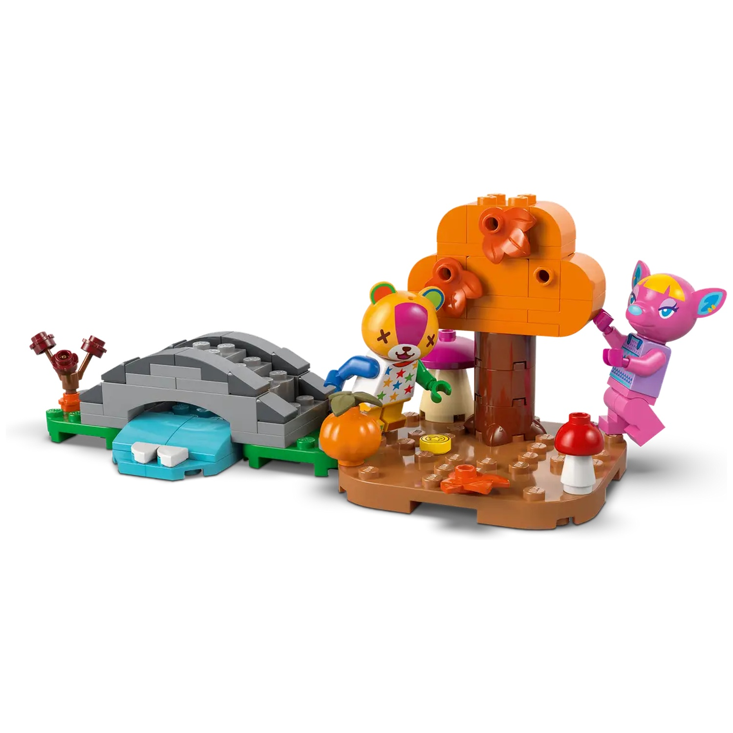 Ensemble Lego avec pont, ruisseau, arbre, champignons et figurines d'animaux. Un arbre orange avec des feuilles et des personnages.
