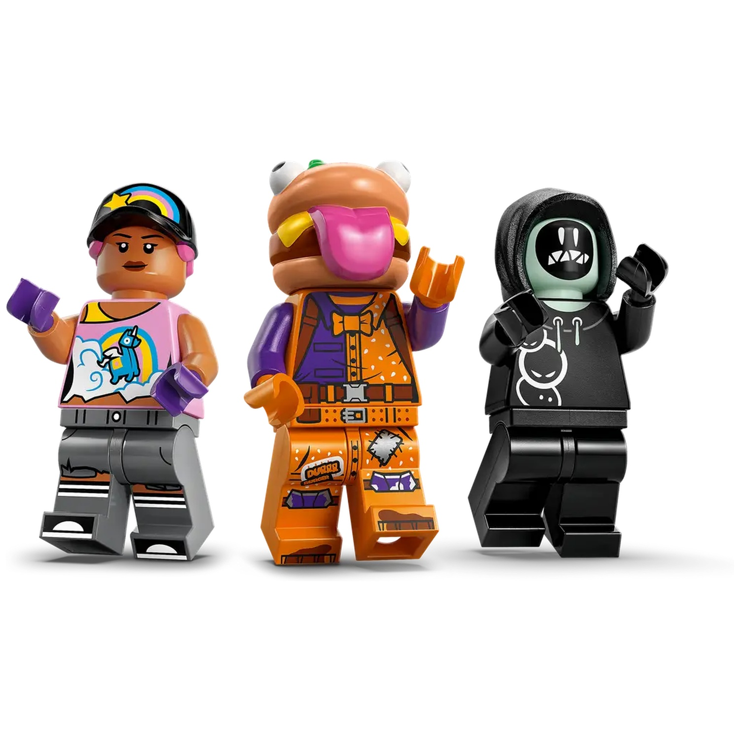 Trois figurines Lego : une fille avec un chapeau arc-en-ciel, une tête de burger et une figurine à capuche noire. Elles sont sur une surface blanche.