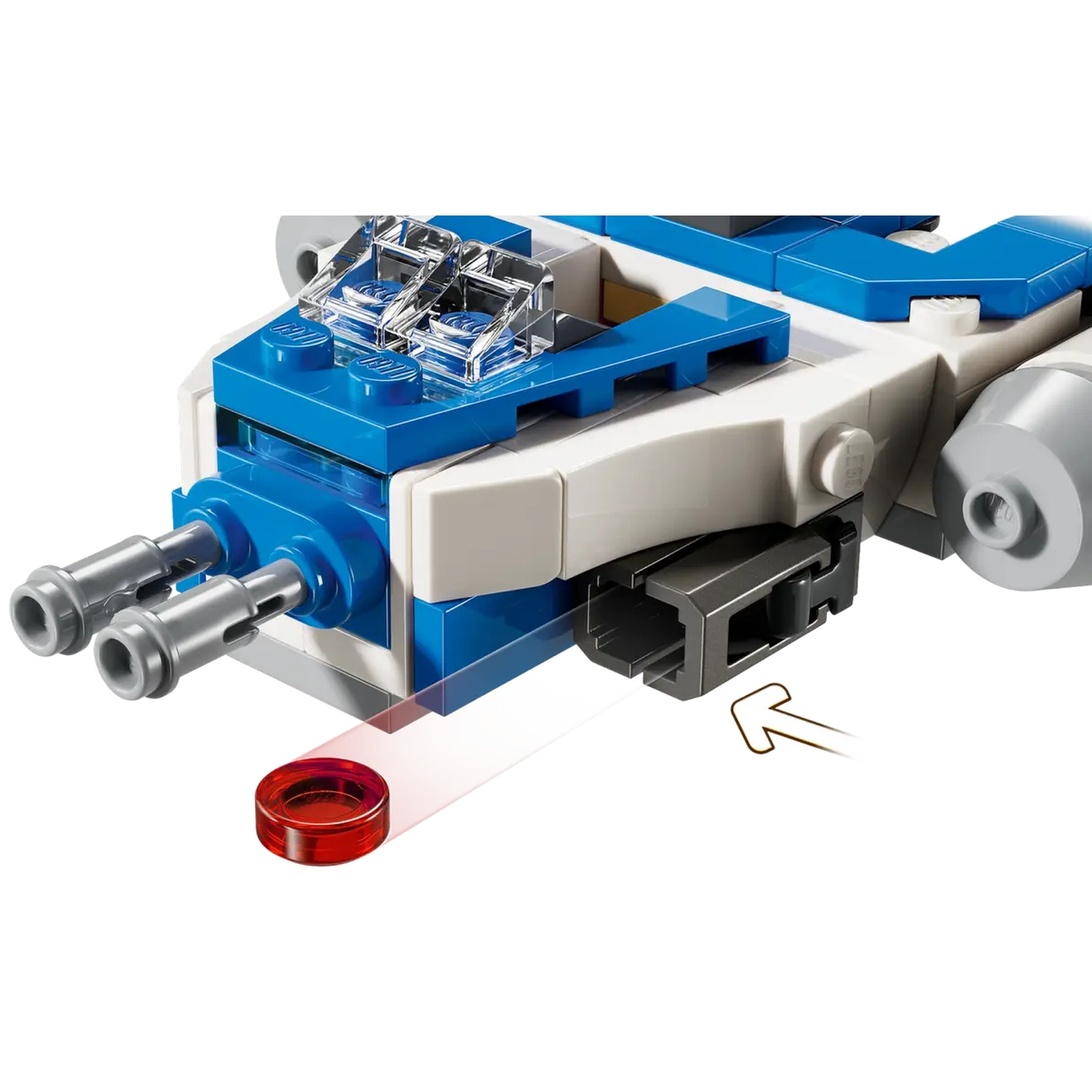 A Lego spaceship with blue and white sections. It has two silver guns and a red disc in front. The arrow points to a dark grey piece.