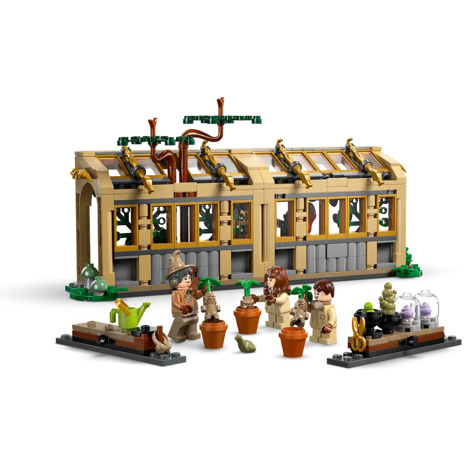 Lego set of a greenhouse with minifigures and plants. Figures are tending to plants in pots. The greenhouse has glass windows.