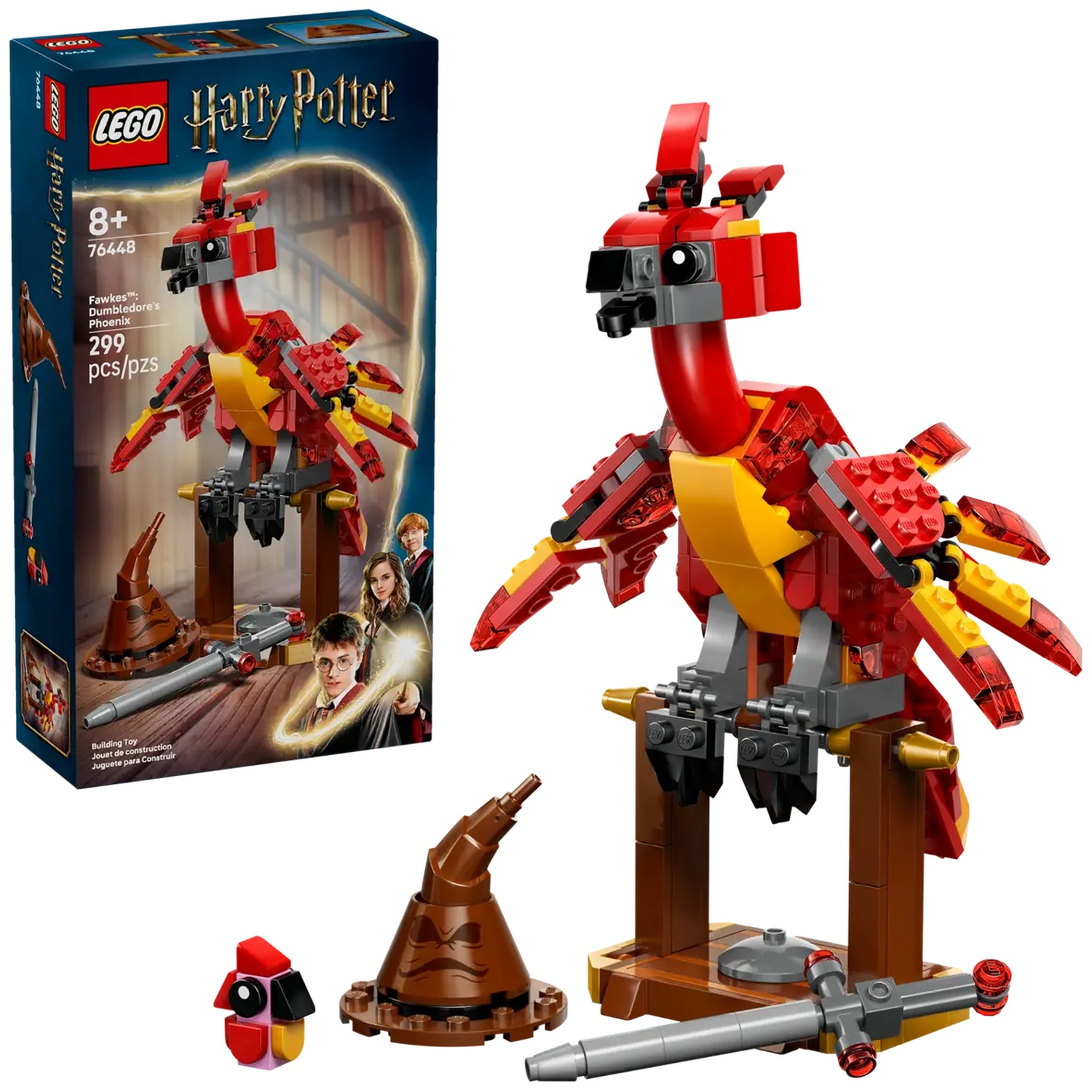 Een Lego Harry Potter set met een rode en gele phoenix, een Sorteerhoed en een zwaard, met de doos op de achtergrond.