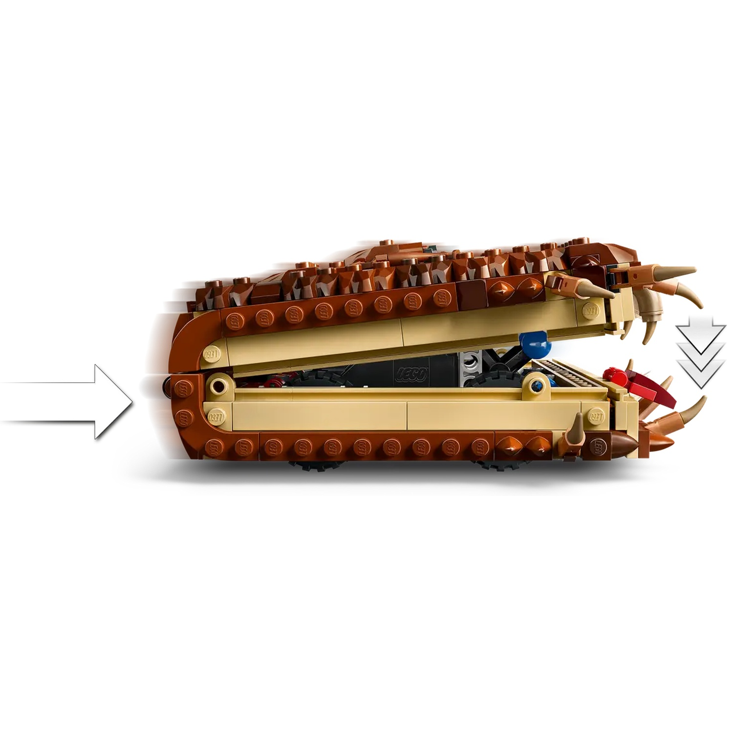 A Lego crocodile-like creature, brown and tan, with open jaws and sharp teeth. A white arrow points towards it.