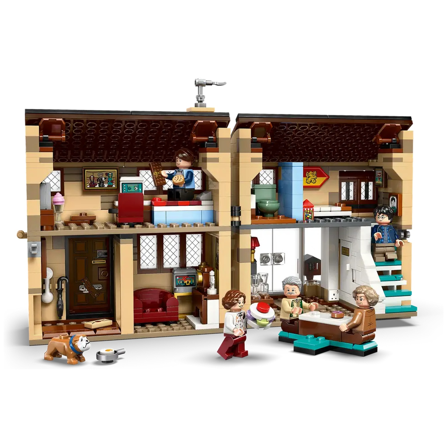 Lego set depicting a house interior with various rooms and Lego figures. Features a dog, kitchen, dining area, and bedrooms.