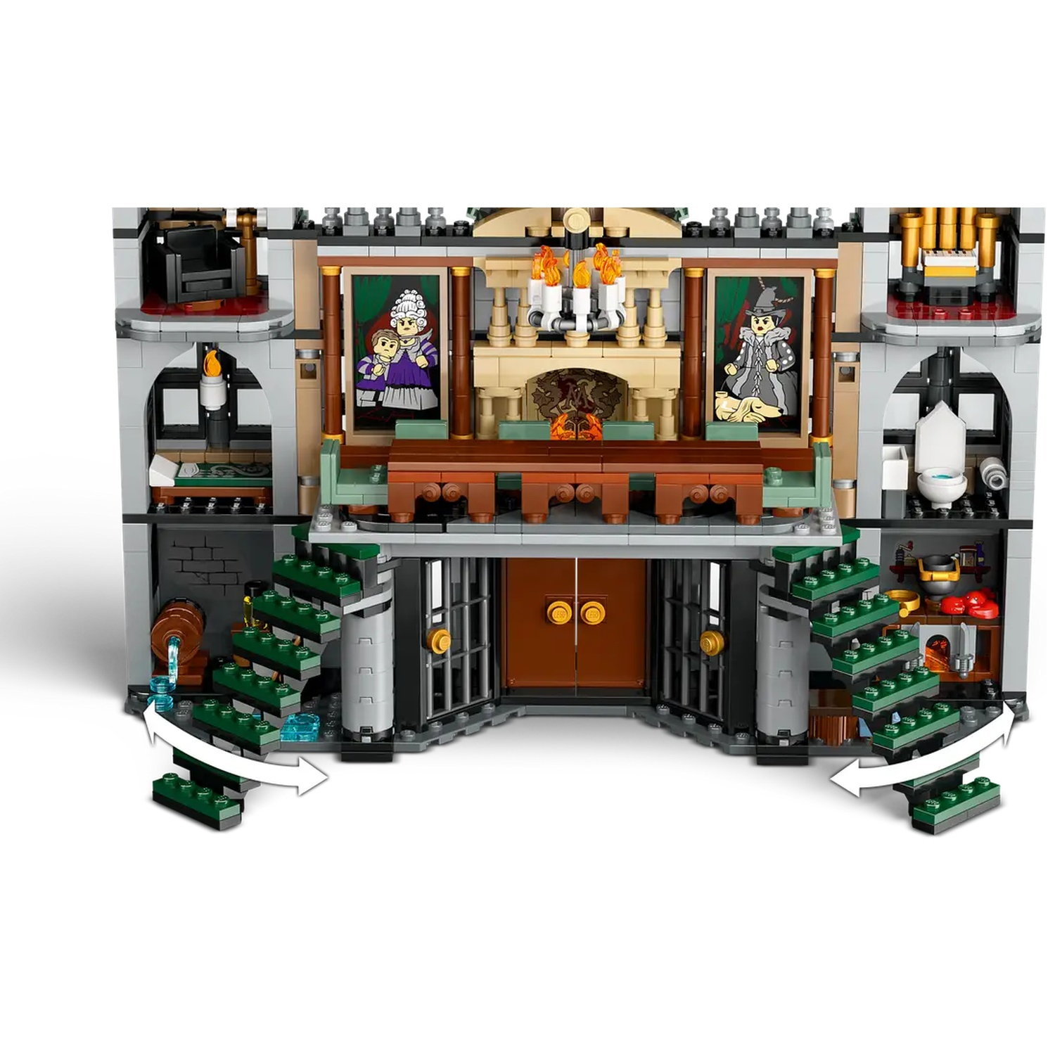 Lego set depicting a multi-level haunted house. Features include rooms, furniture, artwork, and a staircase. The interior is visible.