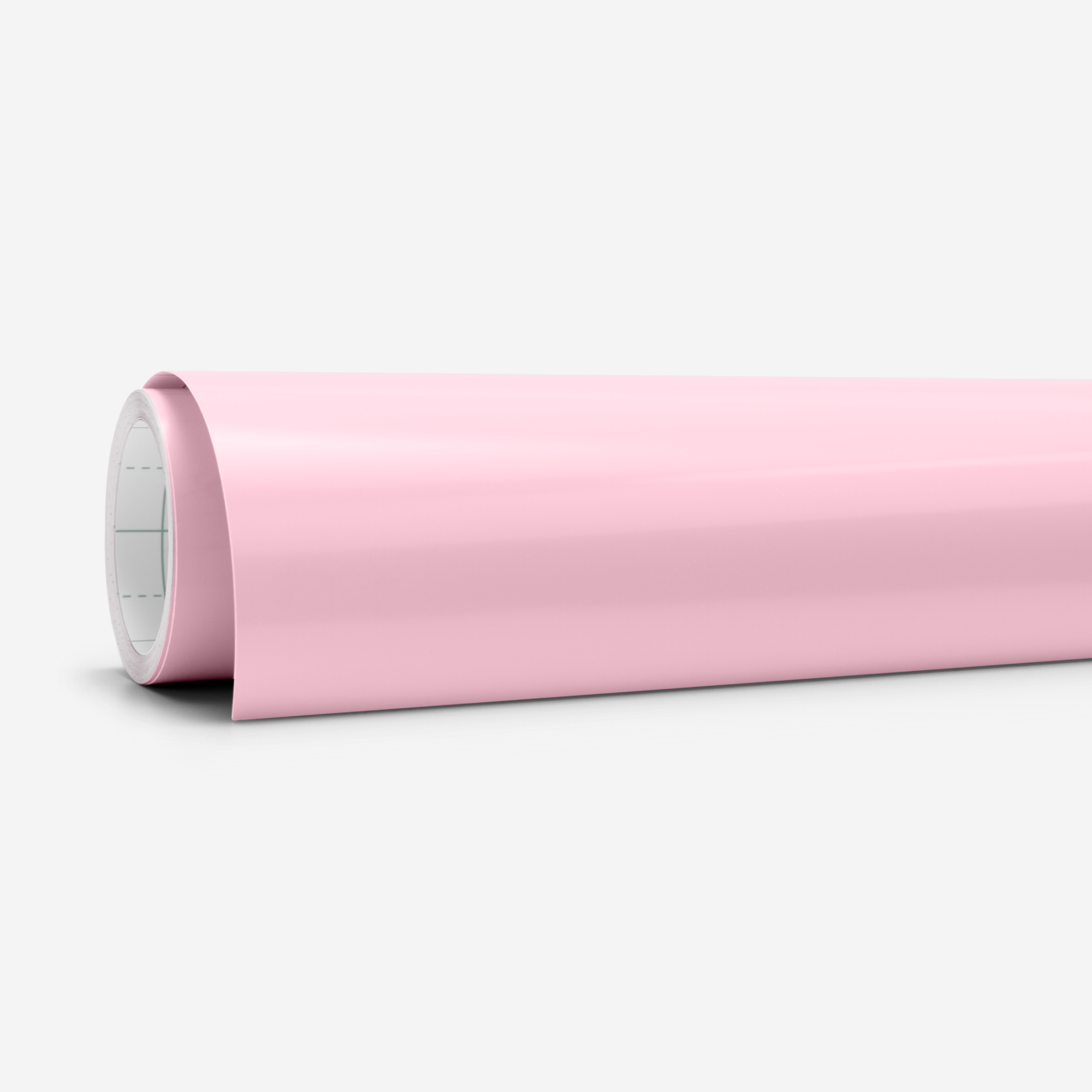 Eine Rolle rosa Vinylmaterial, teilweise abgerollt, vor weißem Hintergrund. Die Rolle ist links.