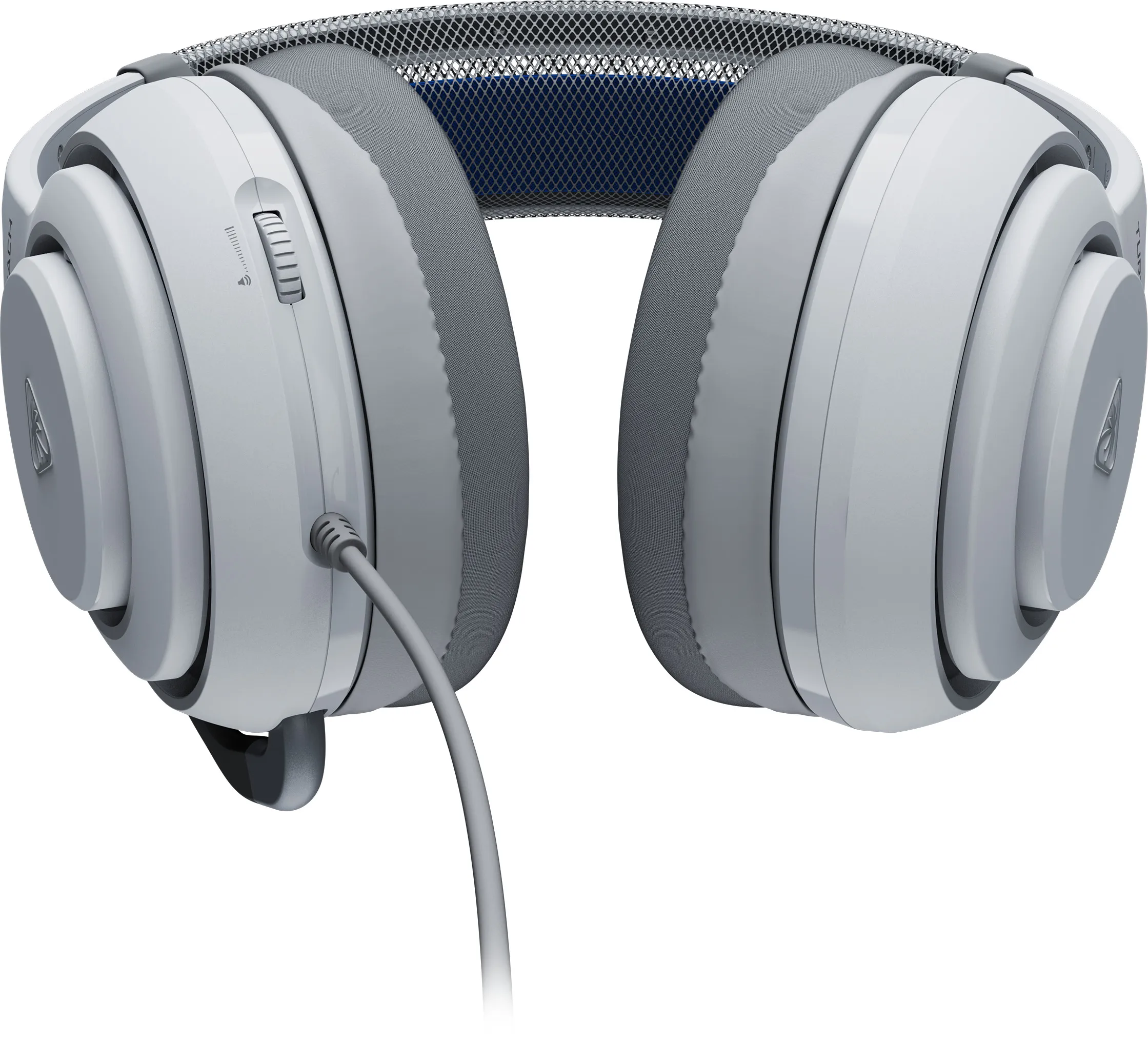 Casque de jeu blanc et gris. Contrôle du volume sur l'écouteur gauche. Câble gris provenant de l'écouteur gauche.