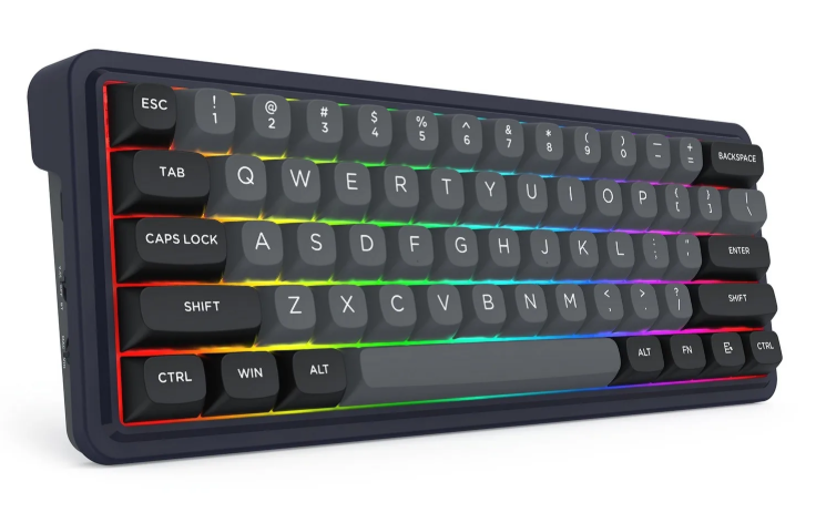 Ciemna, kompaktowa klawiatura z tęczowym podświetleniem. Klawisze są szare z białymi literami i symbolami.