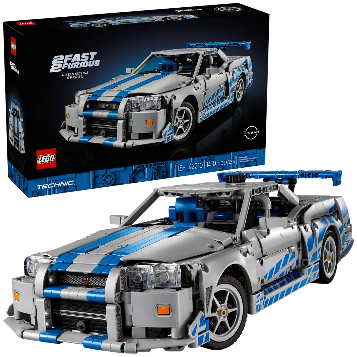 A Lego Technic Nissan Skyline GT-R (R34) model. The box and the car are visible. The car is silver and blue with the Fast & Furious logo.