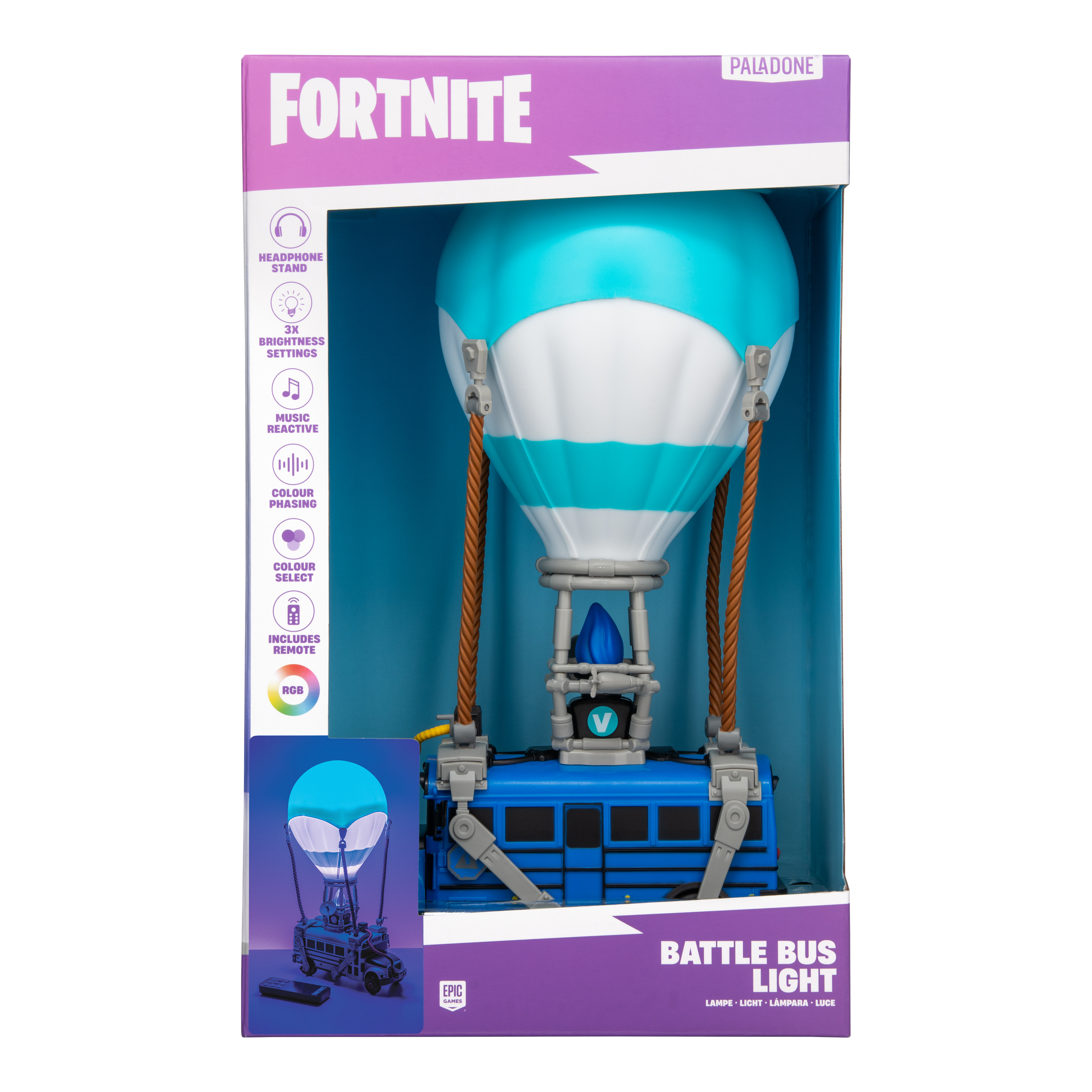 Ein Fortnite Battle Bus-Lichtspielzeug in einer Schachtel. Es hat eine blaue Busbasis und einen weiß-blauen Ballon.