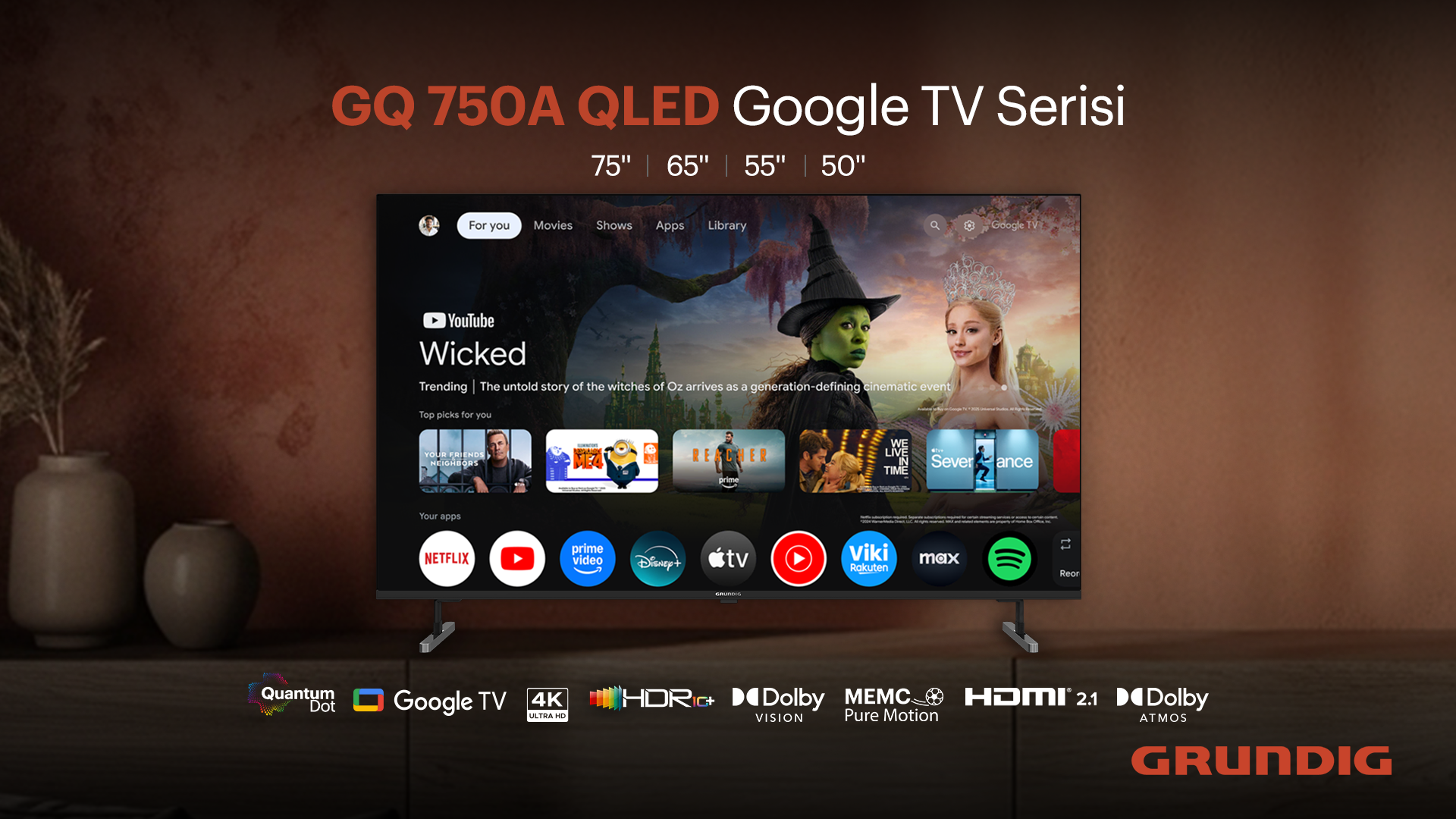 Bir Grundig TV, YouTube uygulamasını görüntülüyor. Ekran 'Wicked' filmini gösteriyor. Netflix, Prime Video ve Disney+ logoları var.
