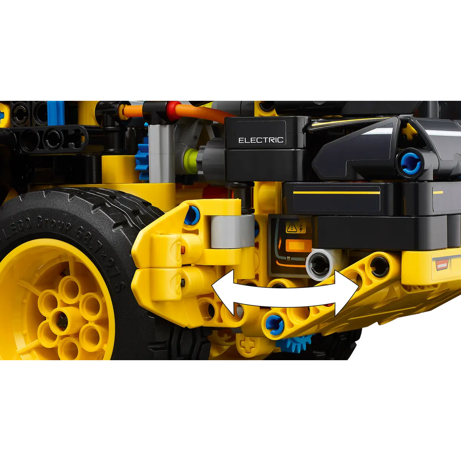 Close-up of a yellow and black Lego Technic vehicle. Features include a tire, 'ELECTRIC' label, and white arrow.