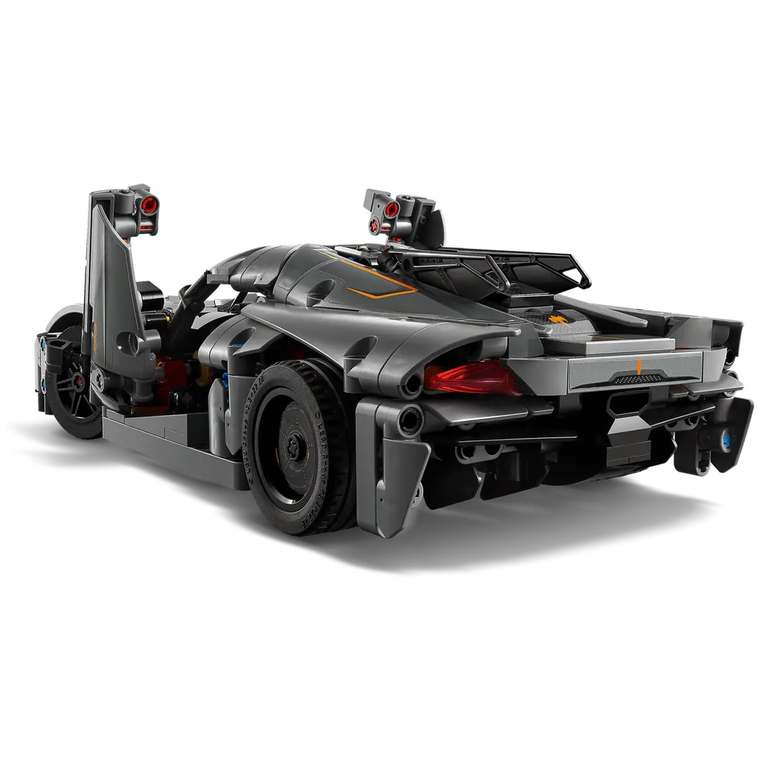 A gray Lego sports car model with black wheels, red lights, and orange accents, set against a white background.