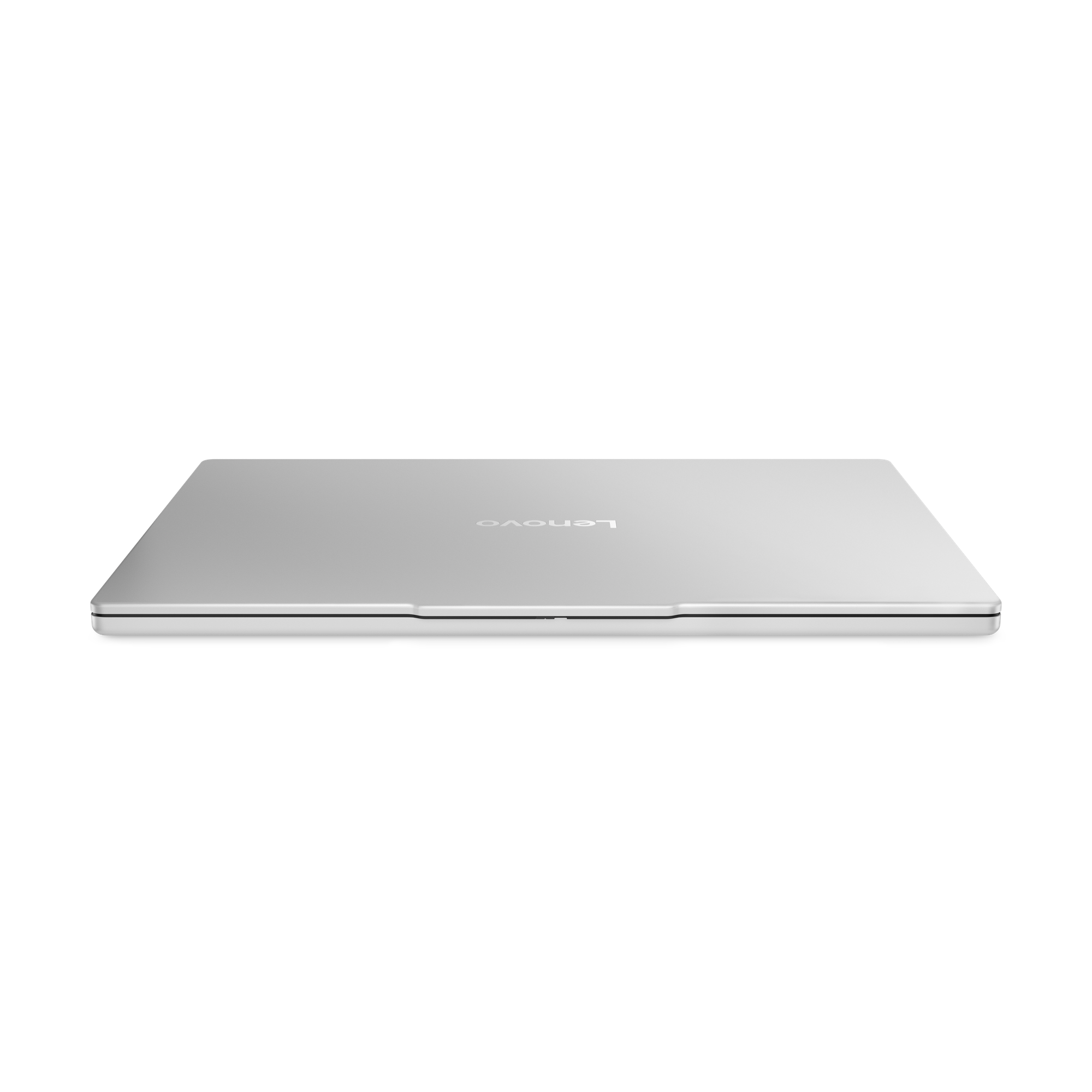 Silberner Laptop, geschlossen, auf schwarzem Hintergrund. Das Lenovo-Logo ist sichtbar. Draufsicht.