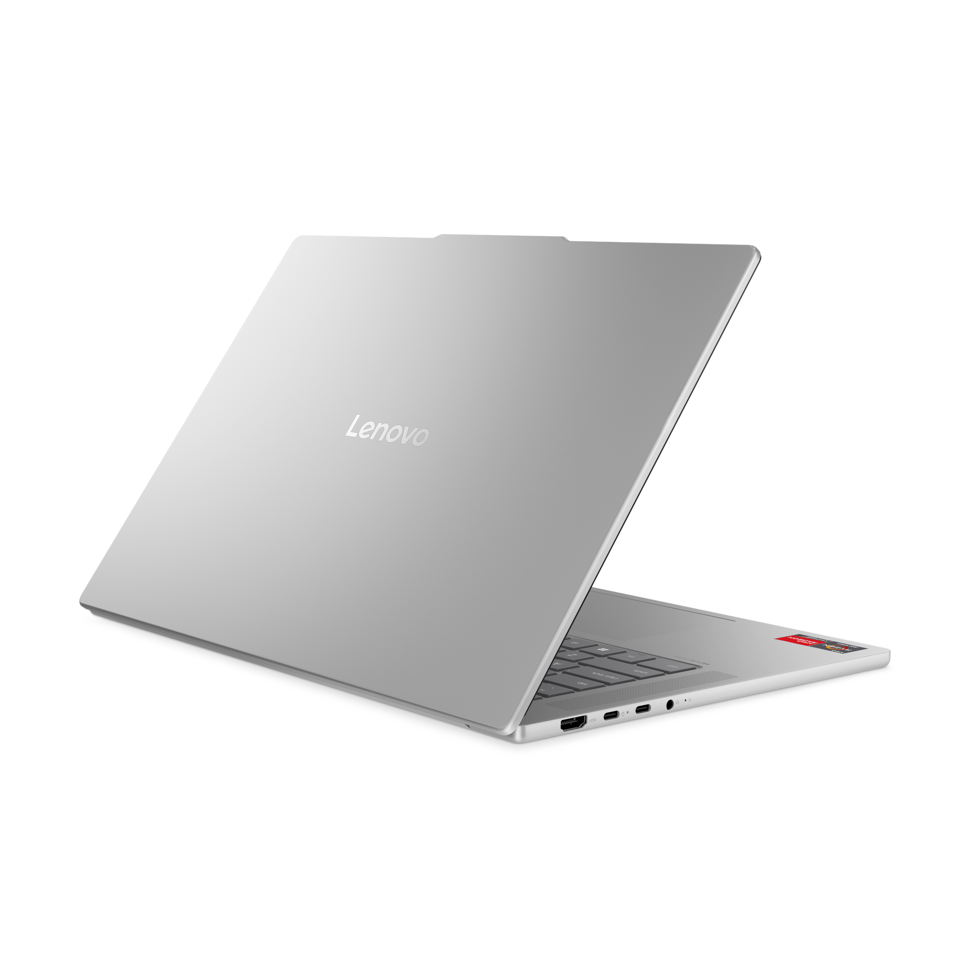 Silberner Lenovo-Laptop, teilweise geöffnet auf schwarzem Hintergrund. Das Lenovo-Logo ist sichtbar.