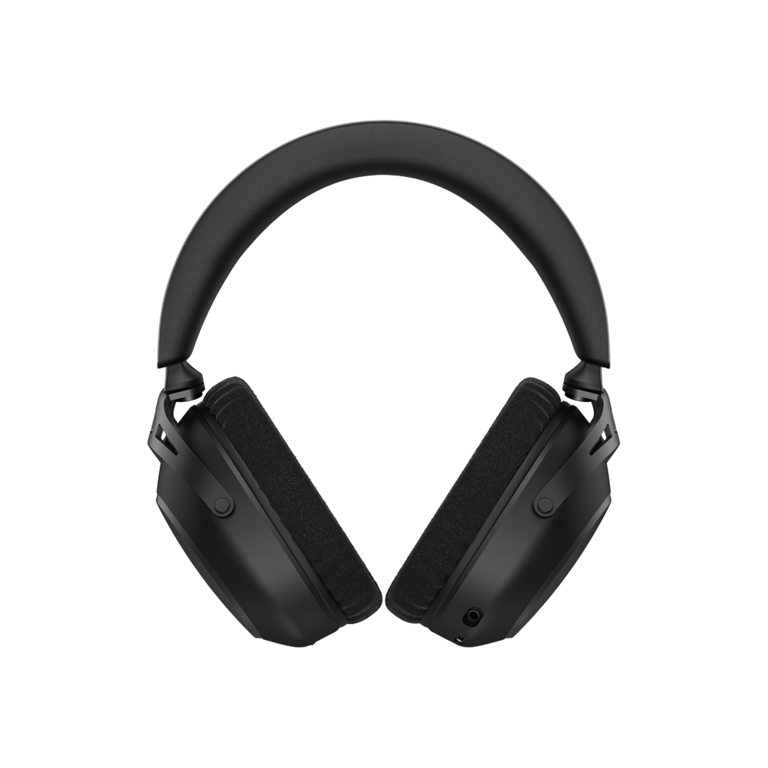 Auriculares negros sobre fondo verde. Los auriculares tienen una diadema y orejeras acolchadas. Las orejeras tienen una tela suave y oscura.