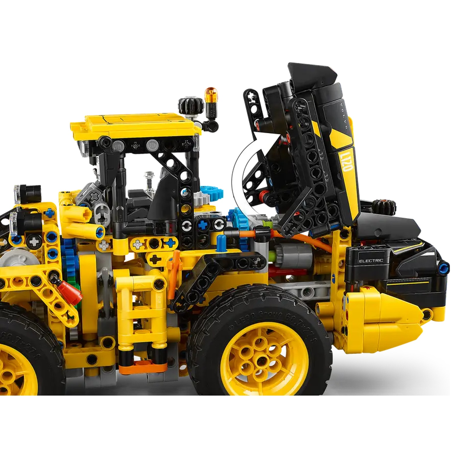 A yellow and black LEGO Technic vehicle is shown. The vehicle has large black tires, a lifting arm and an open compartment.