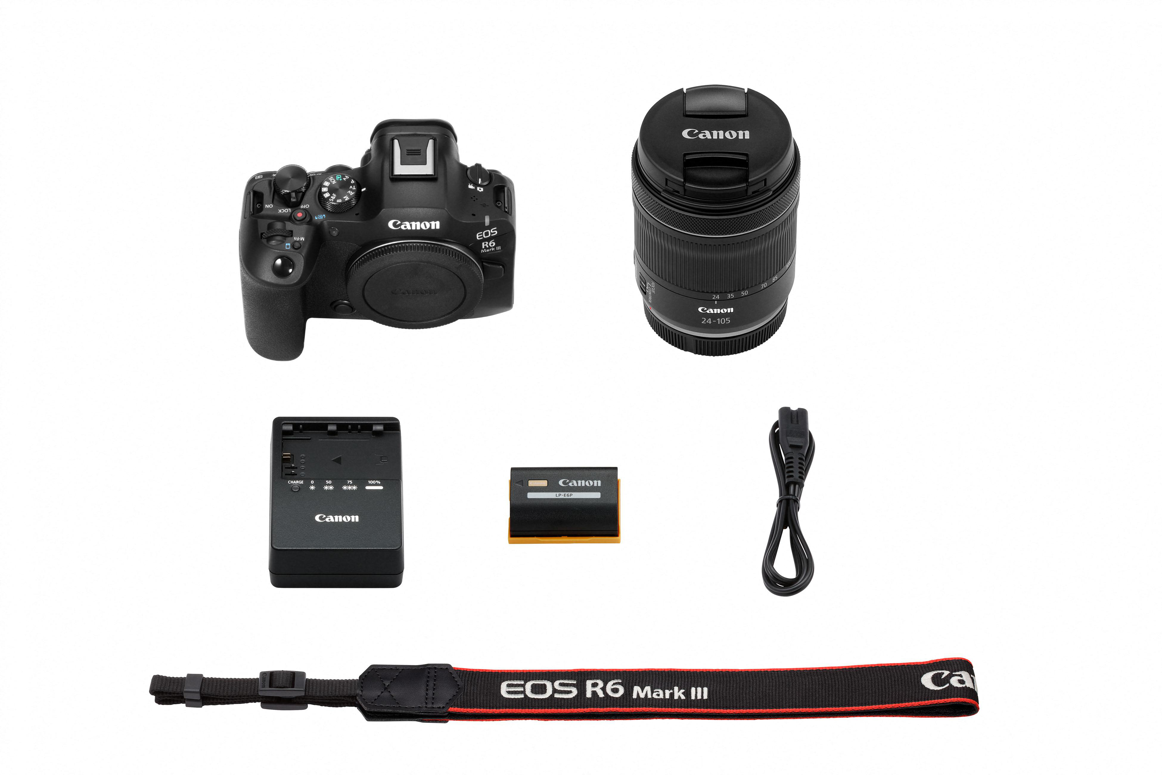 Ein Canon EOS R6 Mark III Kamera-Kit mit Objektiv, Ladegerät, Akku, Gurt und Kabel, angeordnet auf weißem Hintergrund.