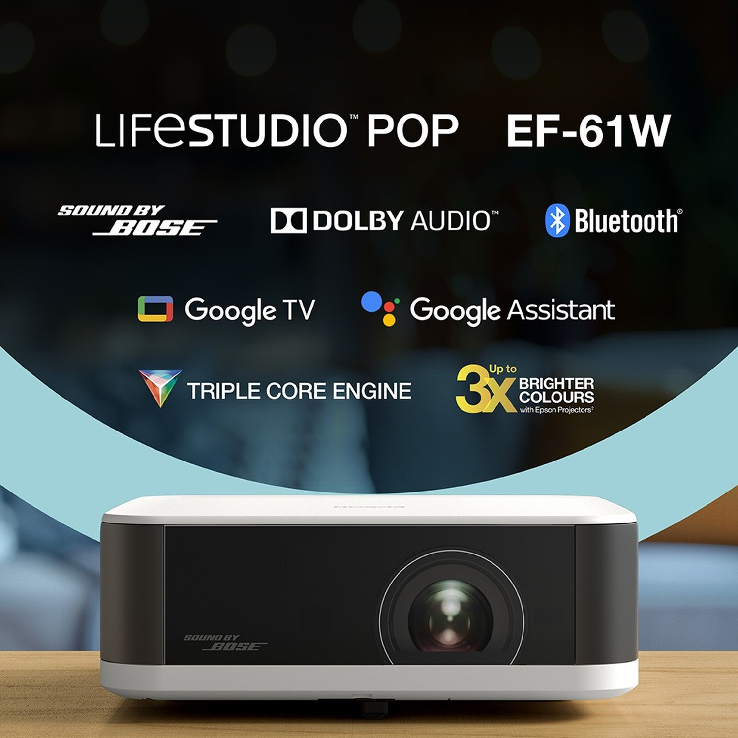 Un proiettore bianco e nero con 'LIFESTUDIO POP EF-61W' e loghi come 'BOSE', 'Dolby', 'Google' e 'Bluetooth'.