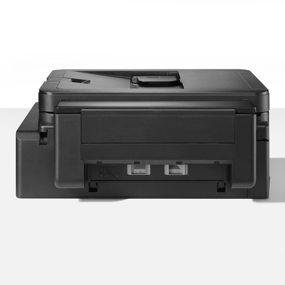 Egy fekete nyomtató oldalsó nézete látható. Lapos teteje van, egy kis nyílással. Az elején két USB-port található.