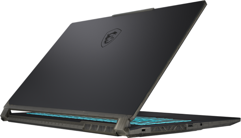 Egy fekete laptop enyhén nyitva van, kék fénnyel világító billentyűzetet és logót mutat a hátulján.