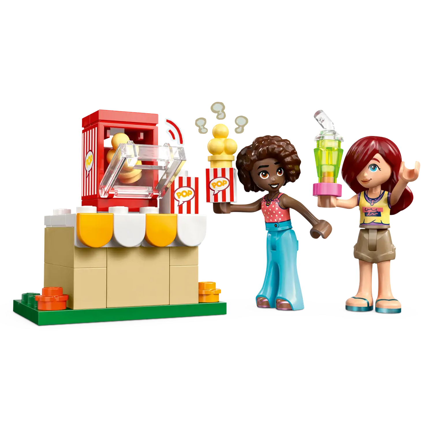 Two Lego figures with popcorn and a drink stand next to a popcorn machine. One figure holds popcorn, the other a green drink.
