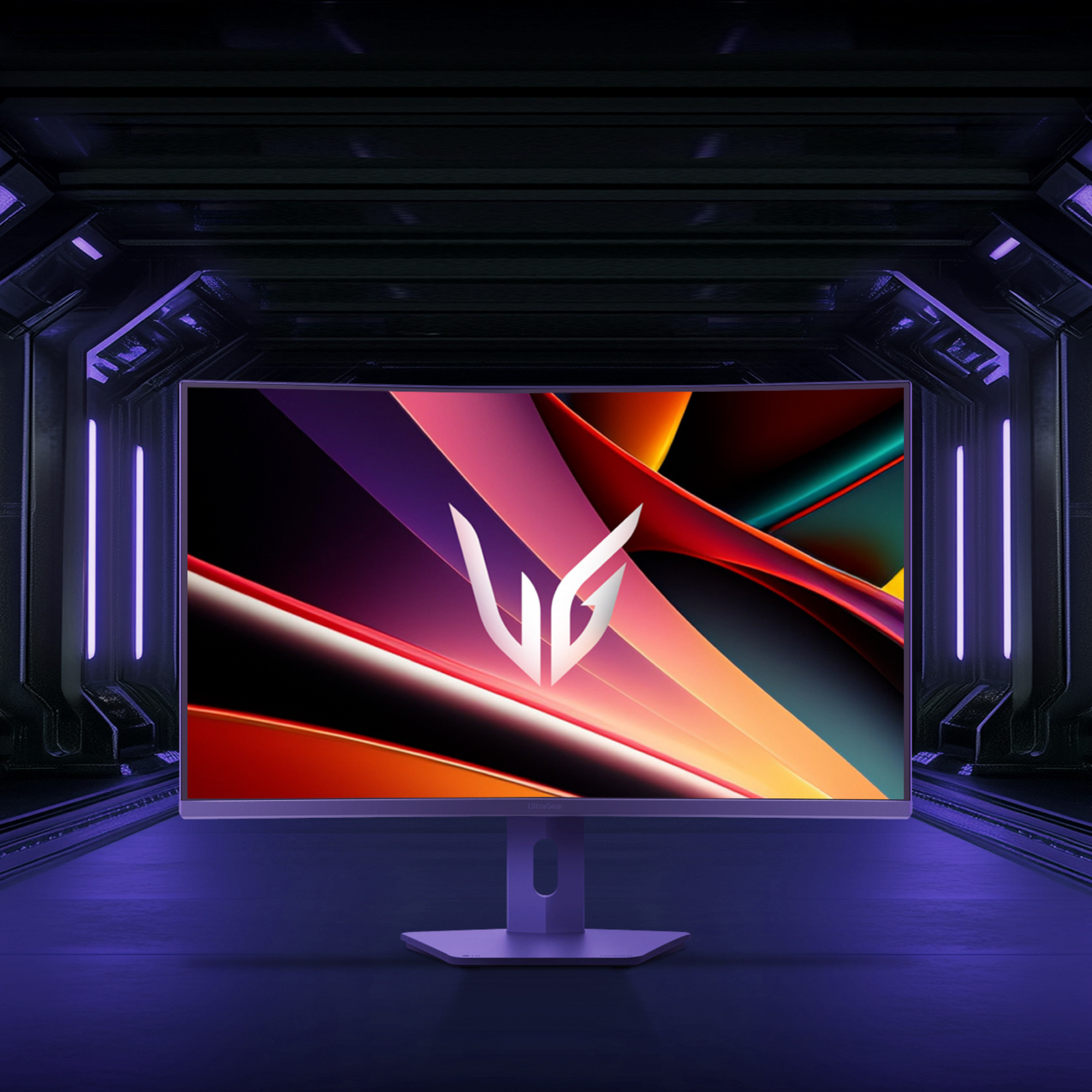Un monitor LG curvo en un entorno futurista. La pantalla muestra un diseño abstracto colorido.