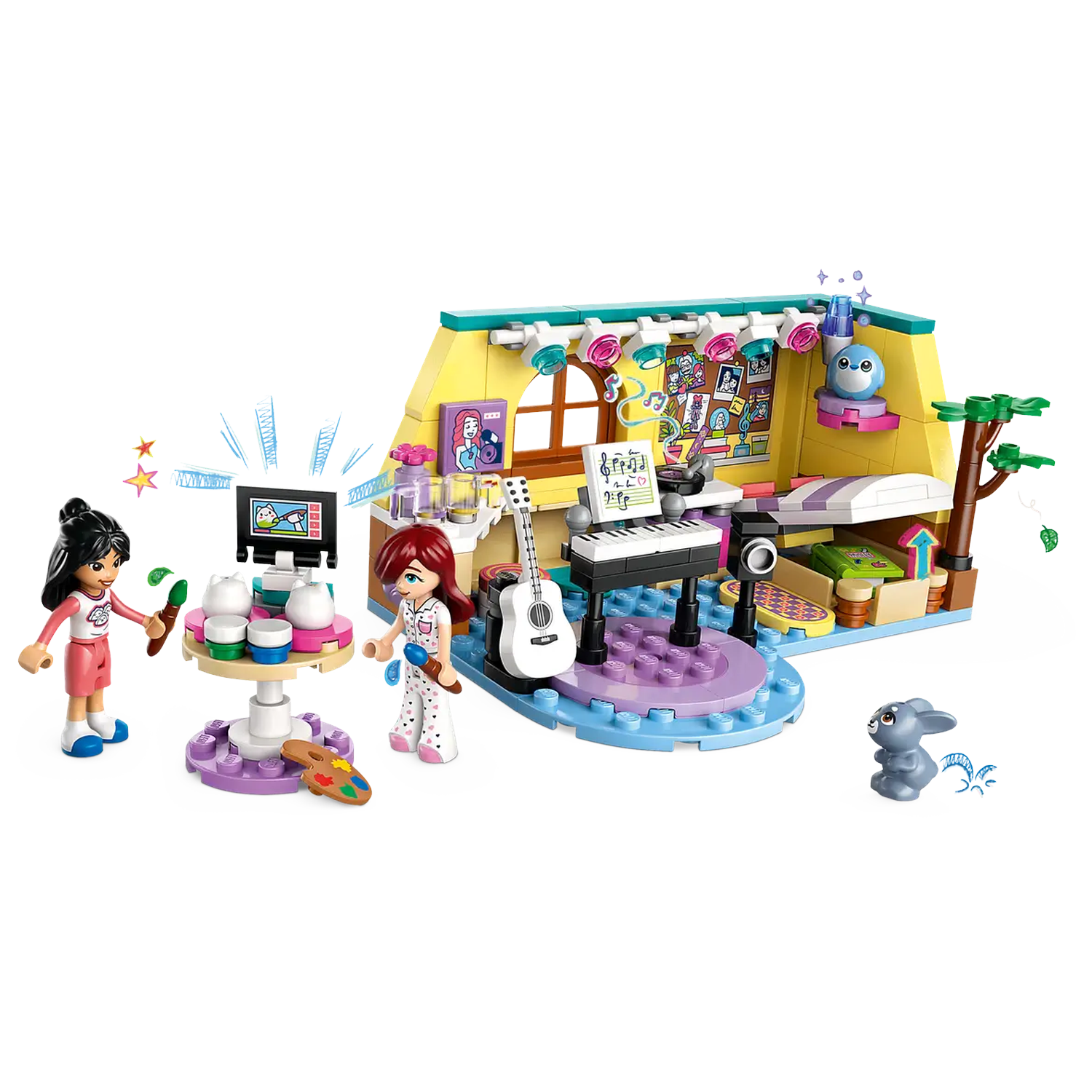 Lego set depicts a music studio with two figures, a guitar, piano, table with art supplies, and a small animal.