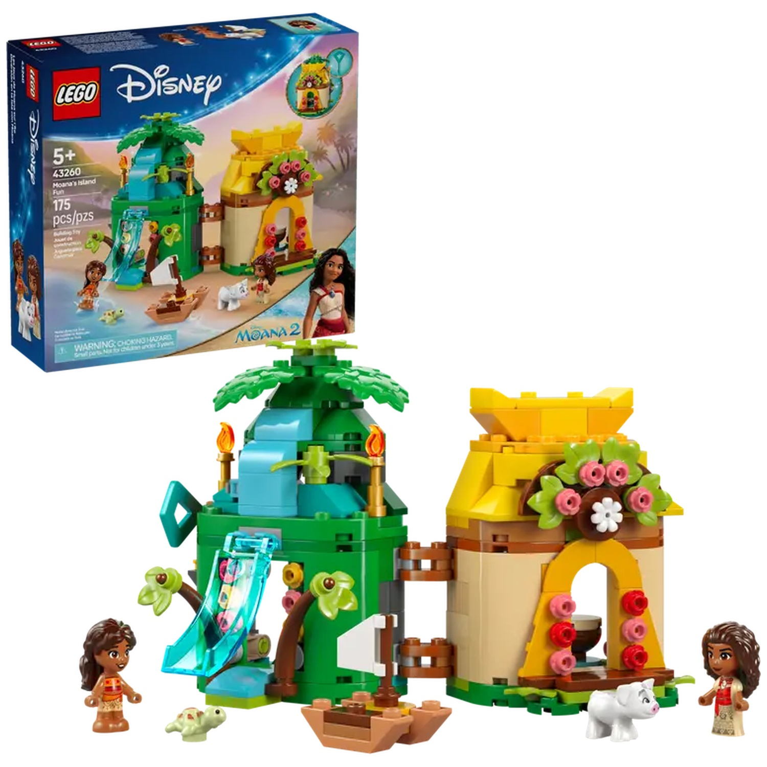 Ensemble Lego représentant l'île de Moana avec des figurines, un toboggan, des structures et un bateau. La boîte est visible en arrière-plan.