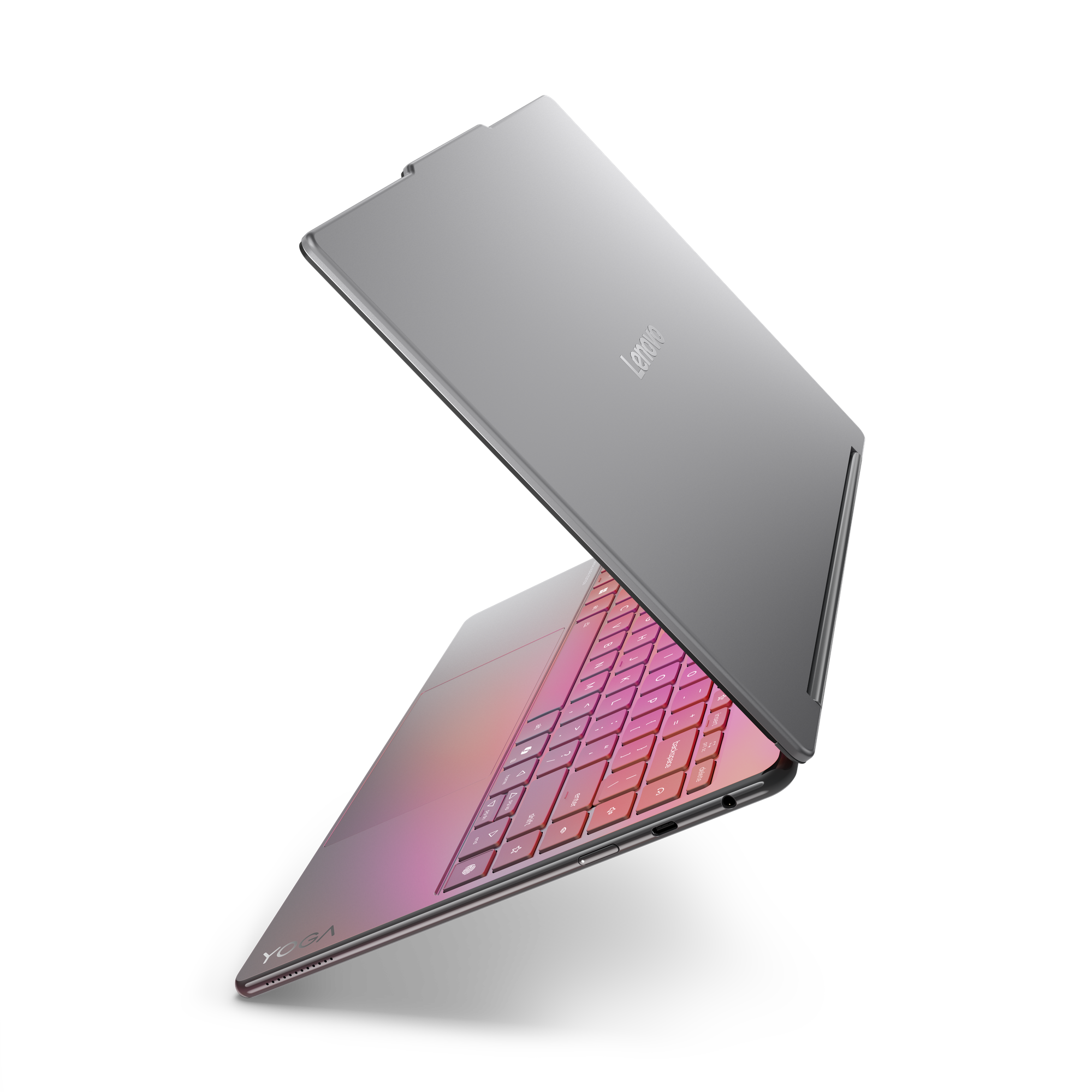 Geöffnetes Lenovo Yoga Laptop auf schwarzem Hintergrund, Tastatur pink-orange leuchtend, Lenovo Logo sichtbar.