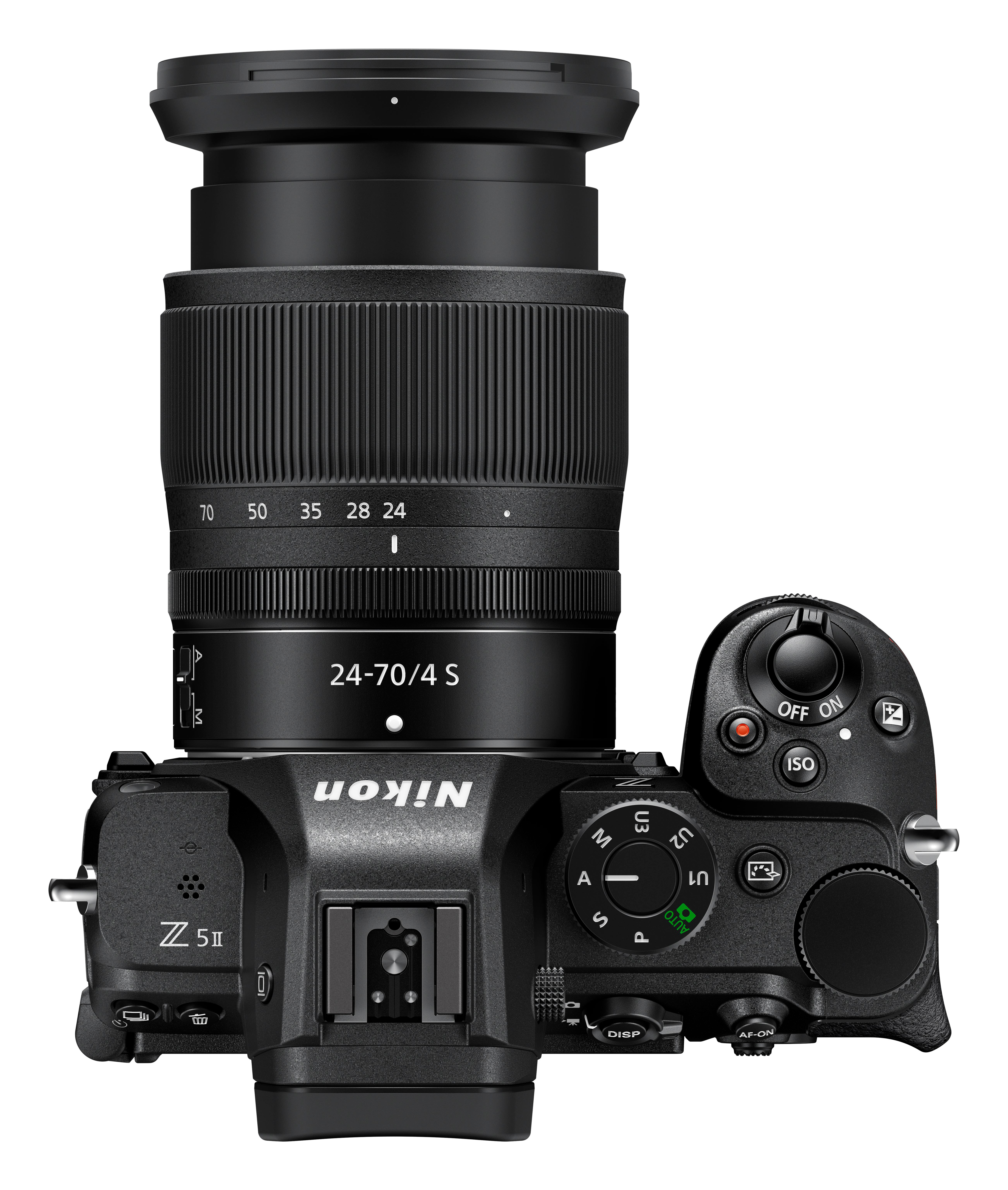 Draufsicht auf eine schwarze Nikon Z 5II Kamera mit Objektiv. Es hat Knöpfe, Räder und ein Display.
