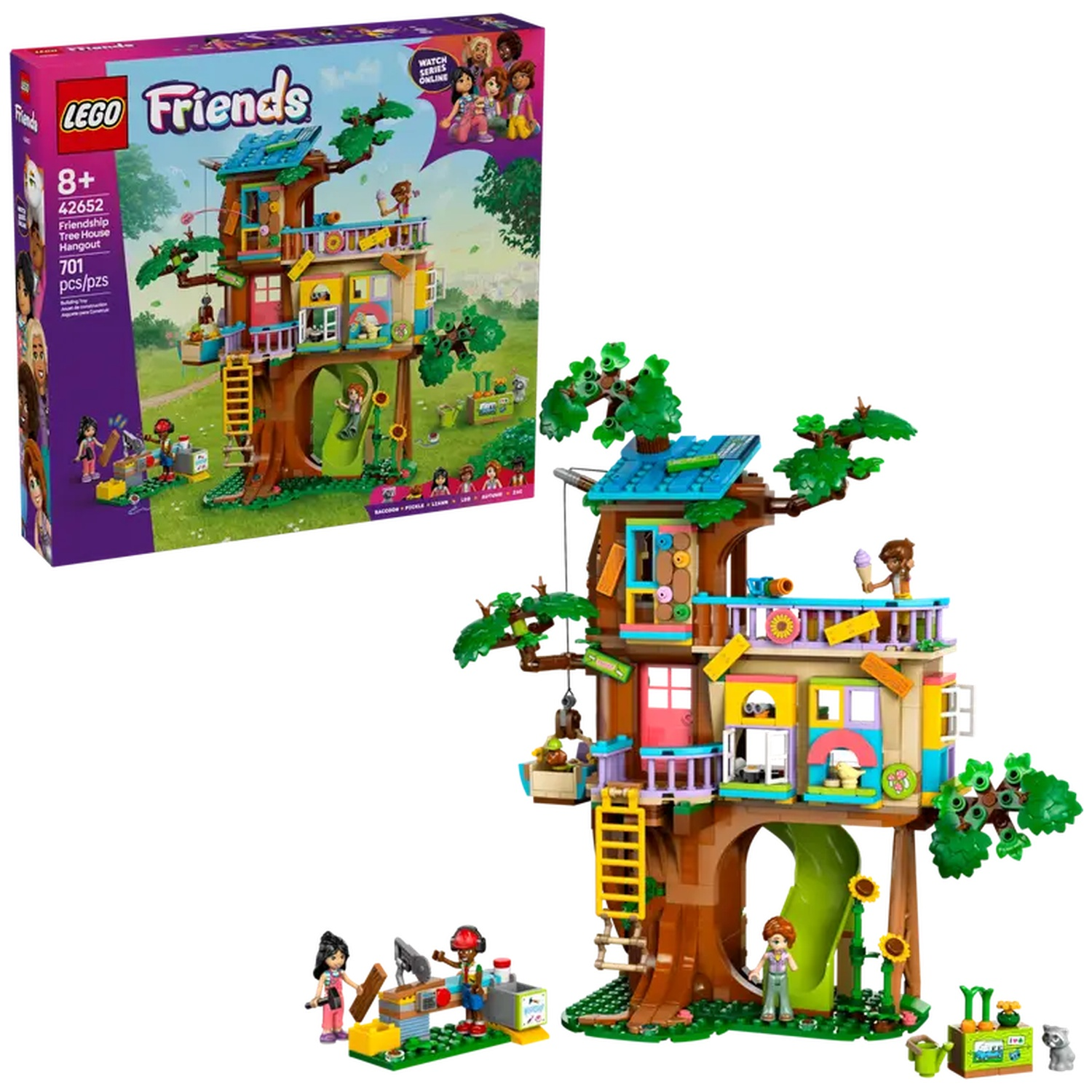 Un ensemble Lego Friends de cabane dans les arbres, avec des figurines, un toboggan et une boîte. La boîte montre l'ensemble et les figurines.