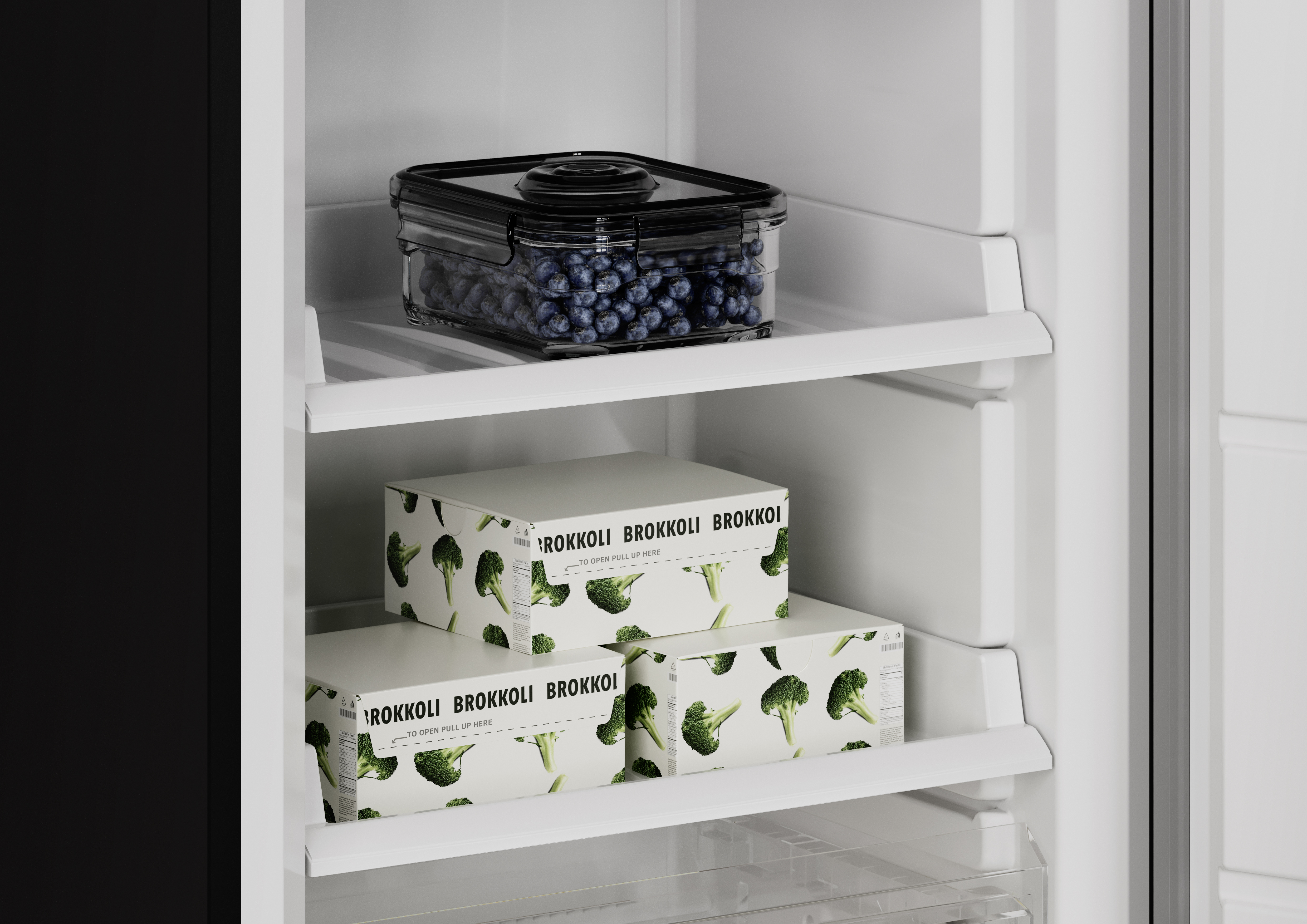 In een koelkast: blauwe bessen in een bakje en broccoli dozen.