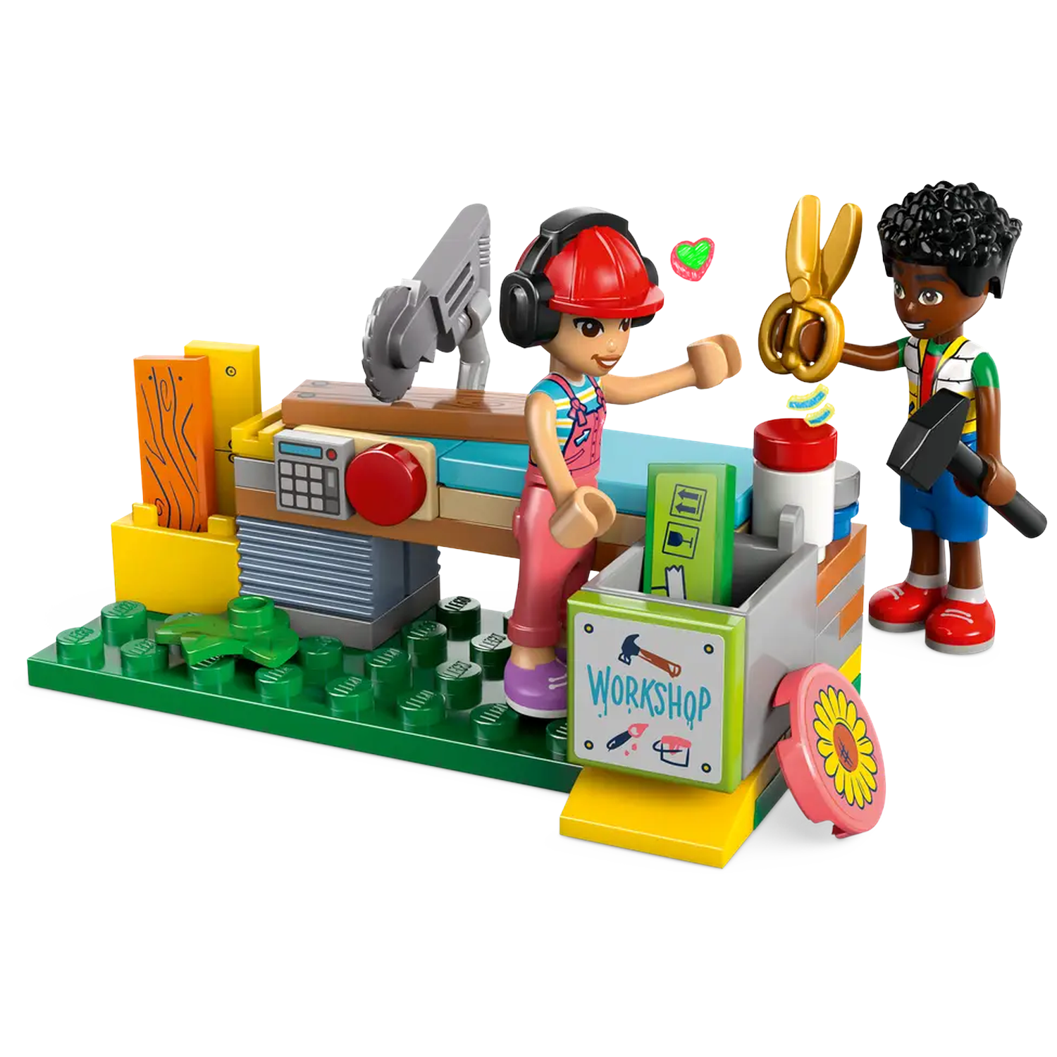 Lego workshop scene with two figures. One holds scissors, the other a hammer. Workshop includes tools, a saw, and a sign.