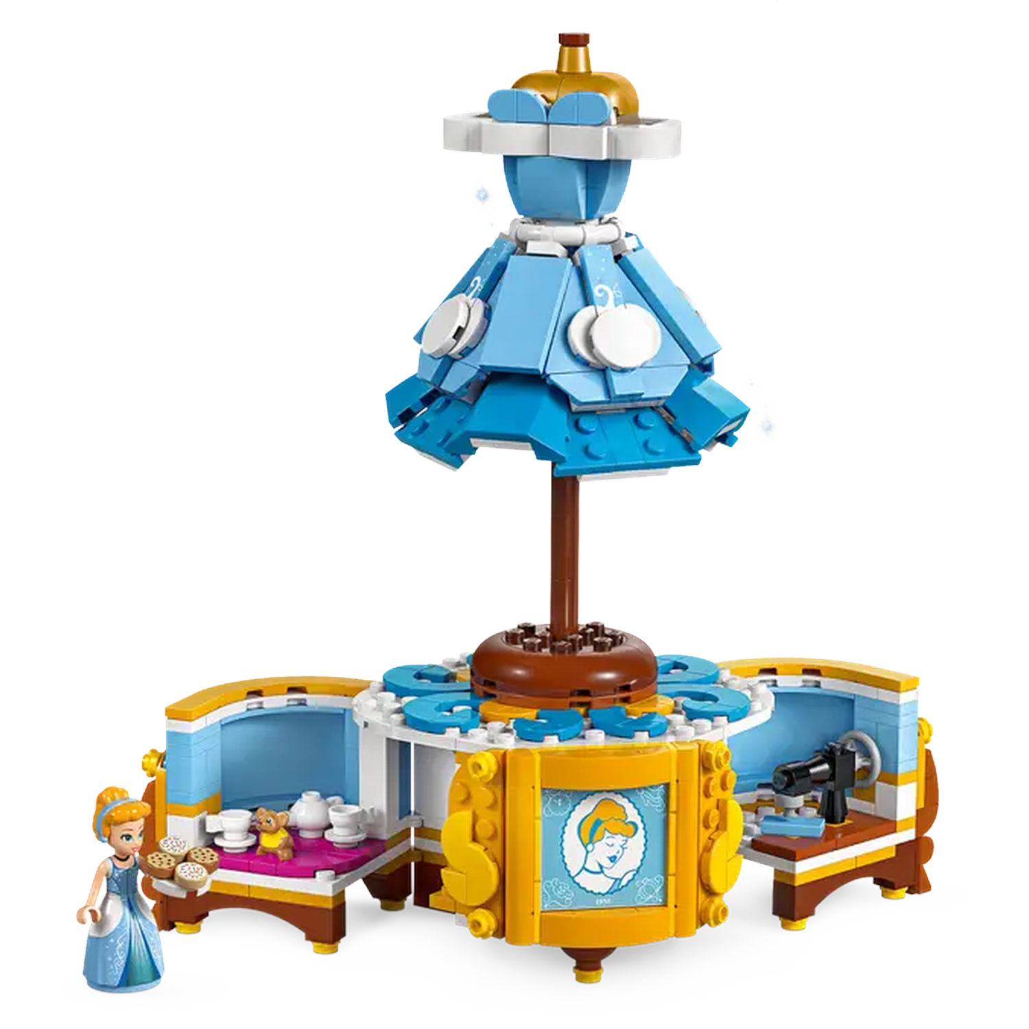 Lego set of Cinderella's dress and accessories. Includes a Cinderella figure, dress form, and small tables with items.