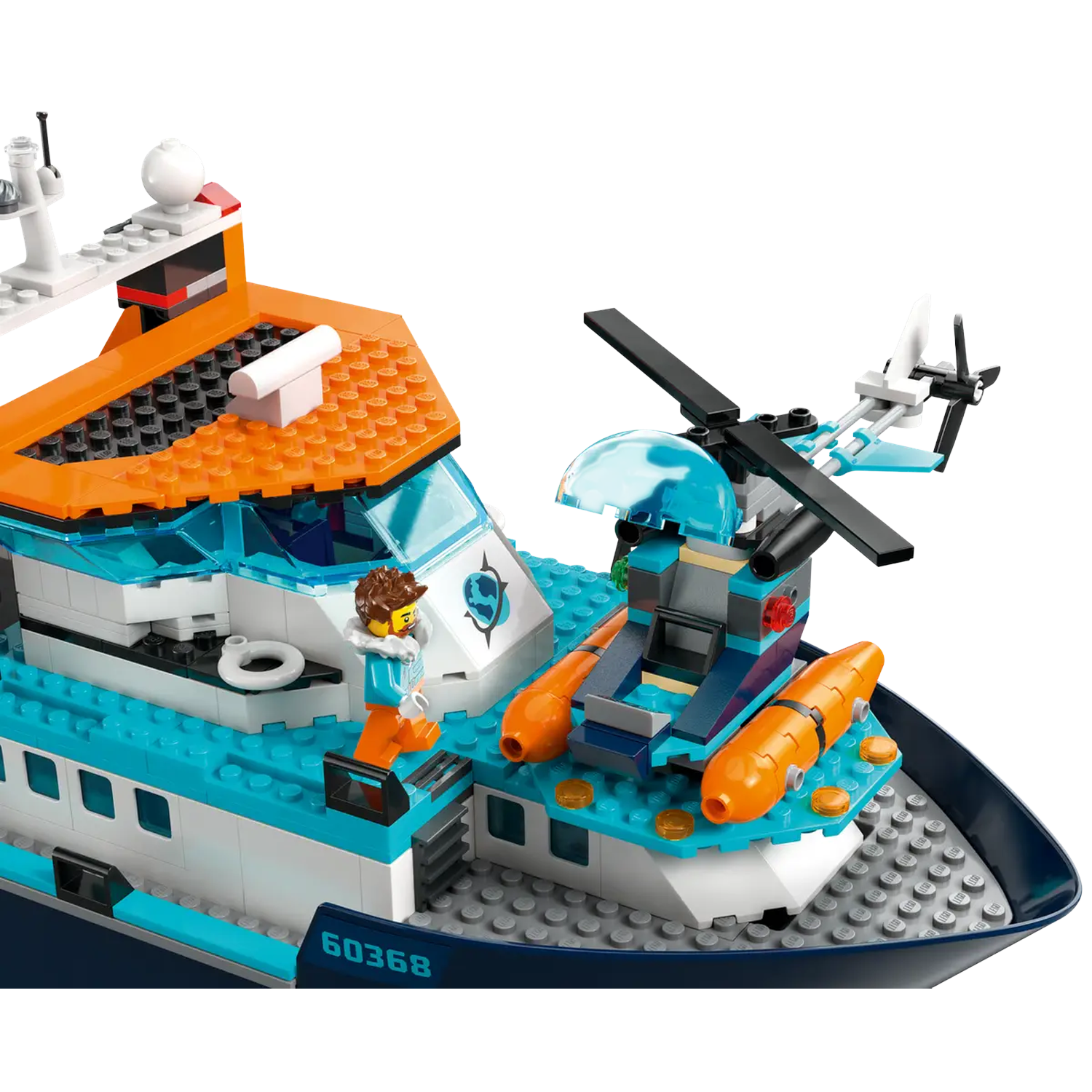 A Lego boat with a helicopter on its deck. It features orange, blue, and white colors with a figure standing.