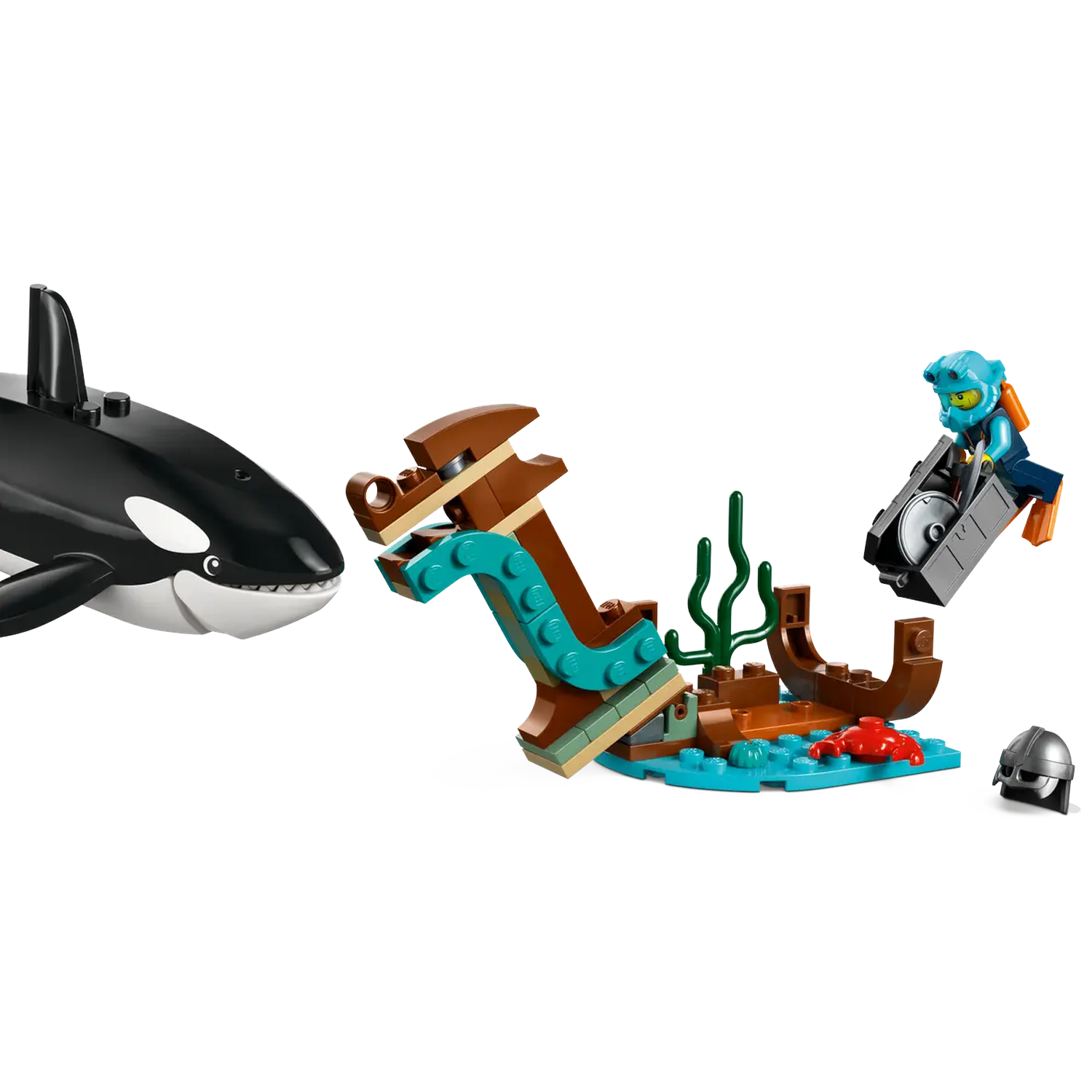 A Lego scene features an orca, a sunken ship, a diver with a saw, and a helmet. The ship has brown and turquoise blocks.