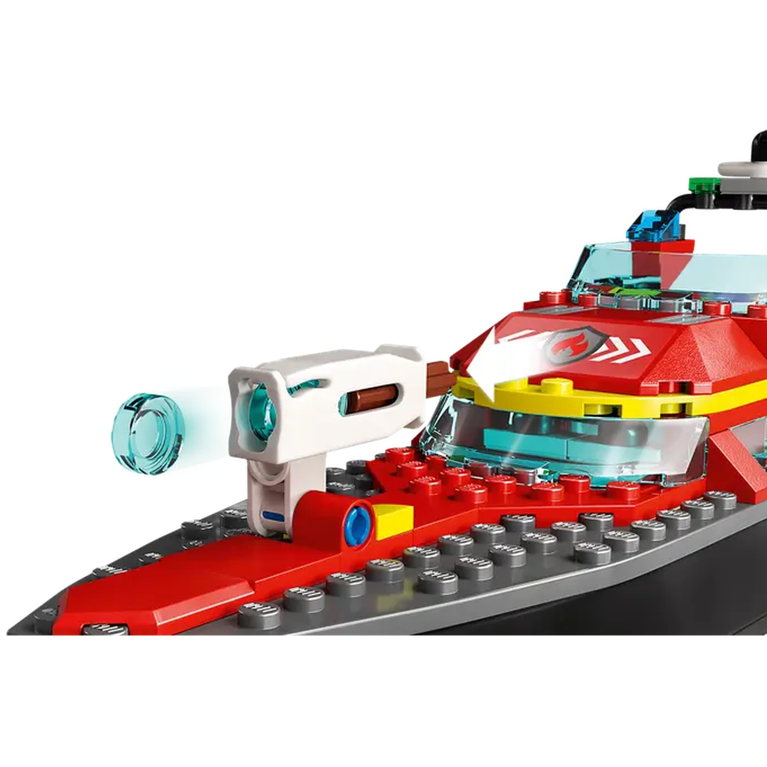 Un bateau de pompiers Lego avec des briques rouges, jaunes et grises. Une lumière blanche avec un projectile bleu à l'avant.