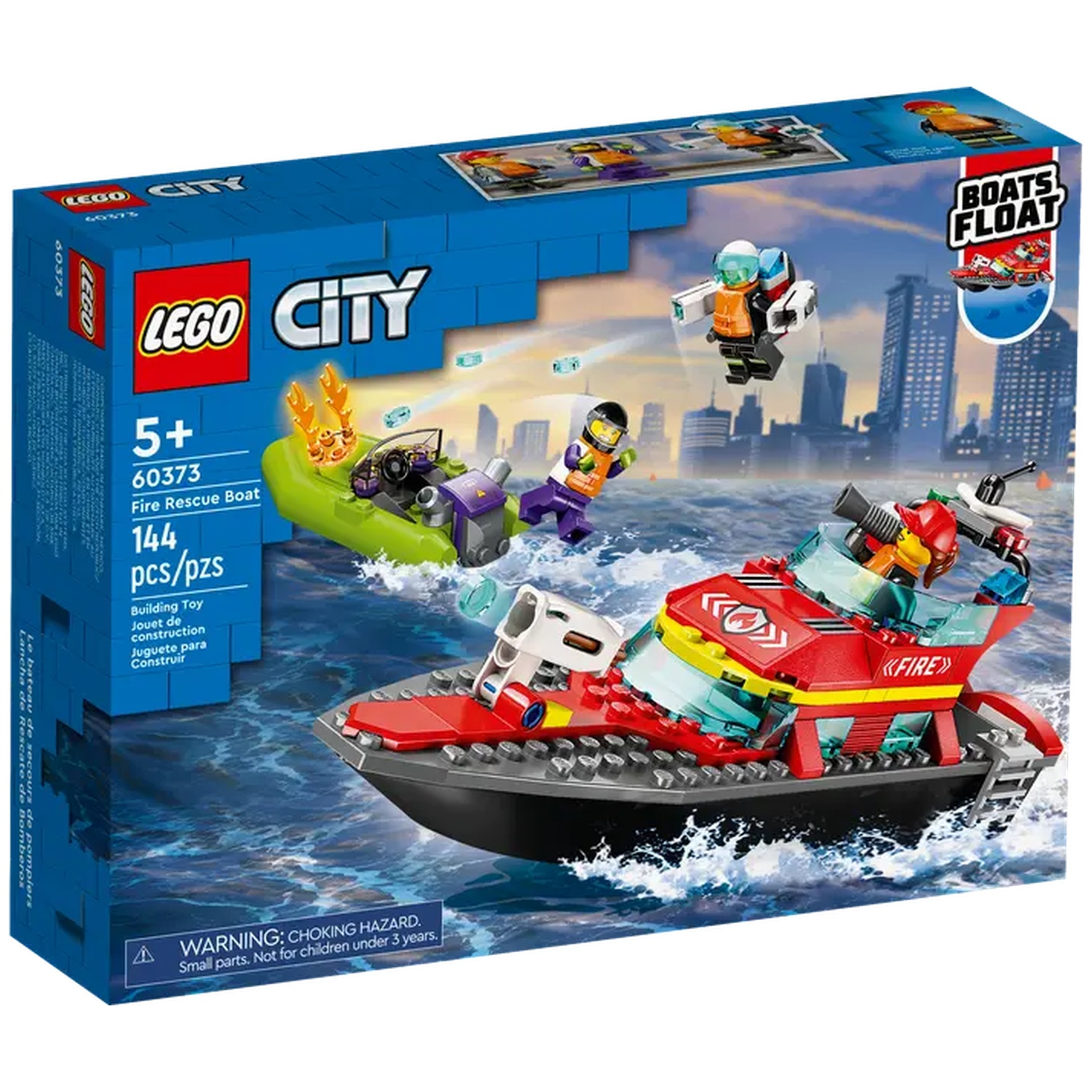 Boîte Lego City Fire Rescue Boat. Un bateau de pompiers rouge et noir, deux petits bateaux et des figurines Lego sont affichés.