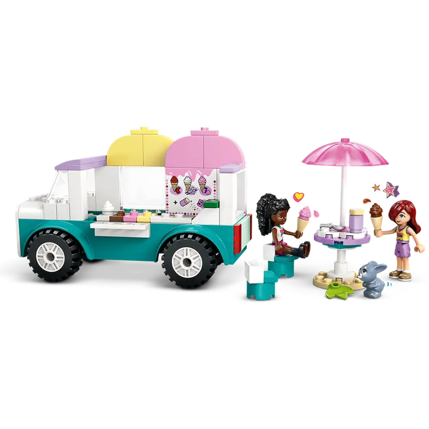 A colorful ice cream truck toy with figures. Two girls with ice cream cones, a table with umbrella, and a gray bunny are present.