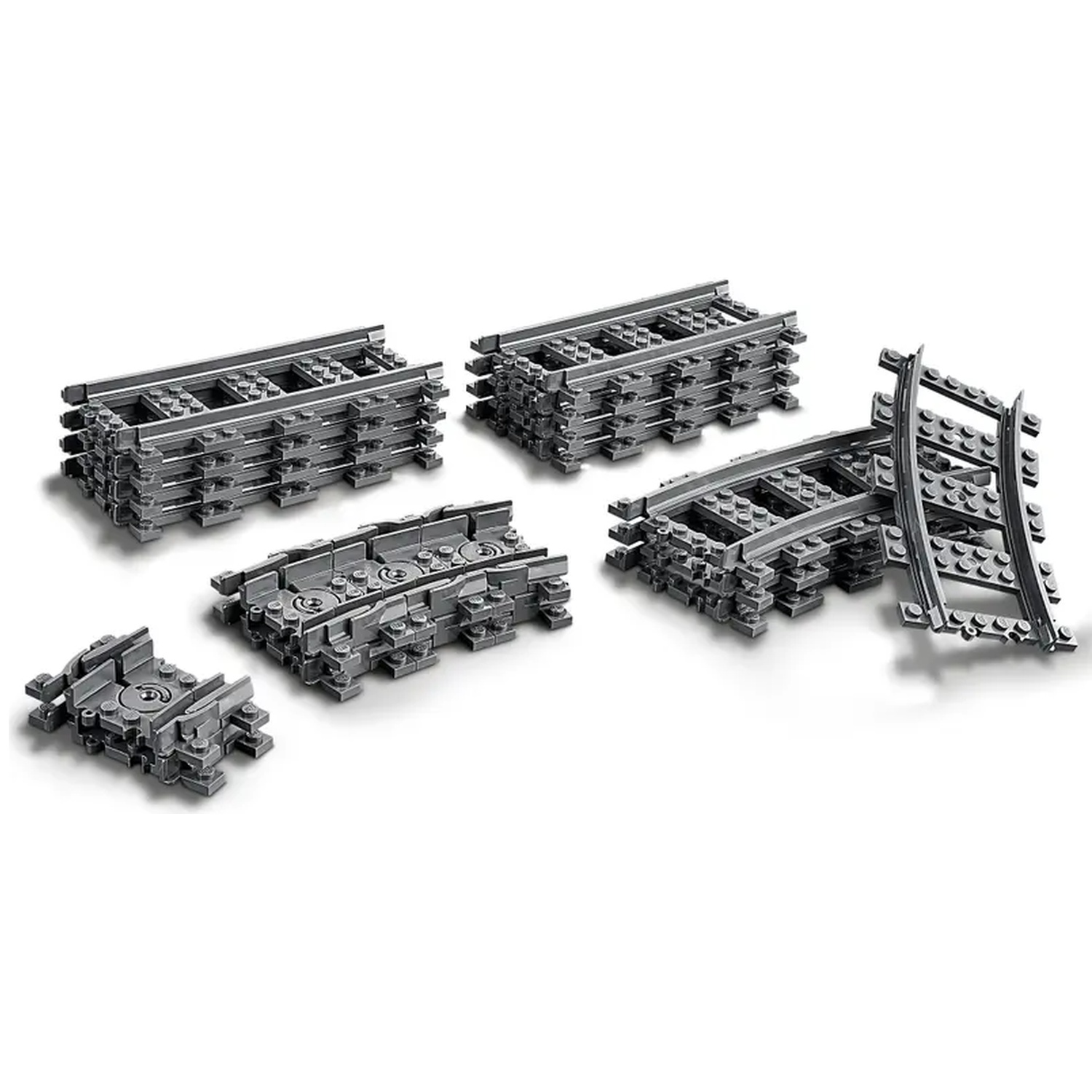 Several gray Lego train tracks are arranged on a white surface. They are straight, curved, and assembled in stacks.