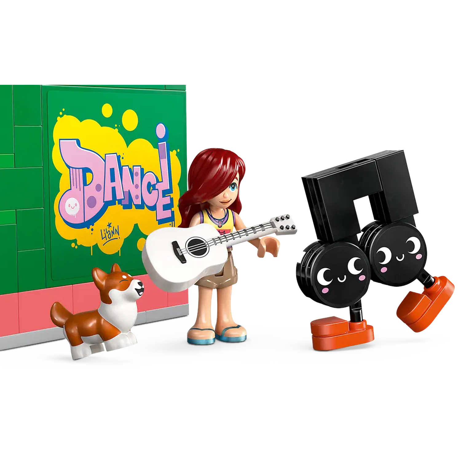 A Lego scene shows a girl with a guitar, a dog, and a music note character in front of a green wall with the word 'DANCE'.