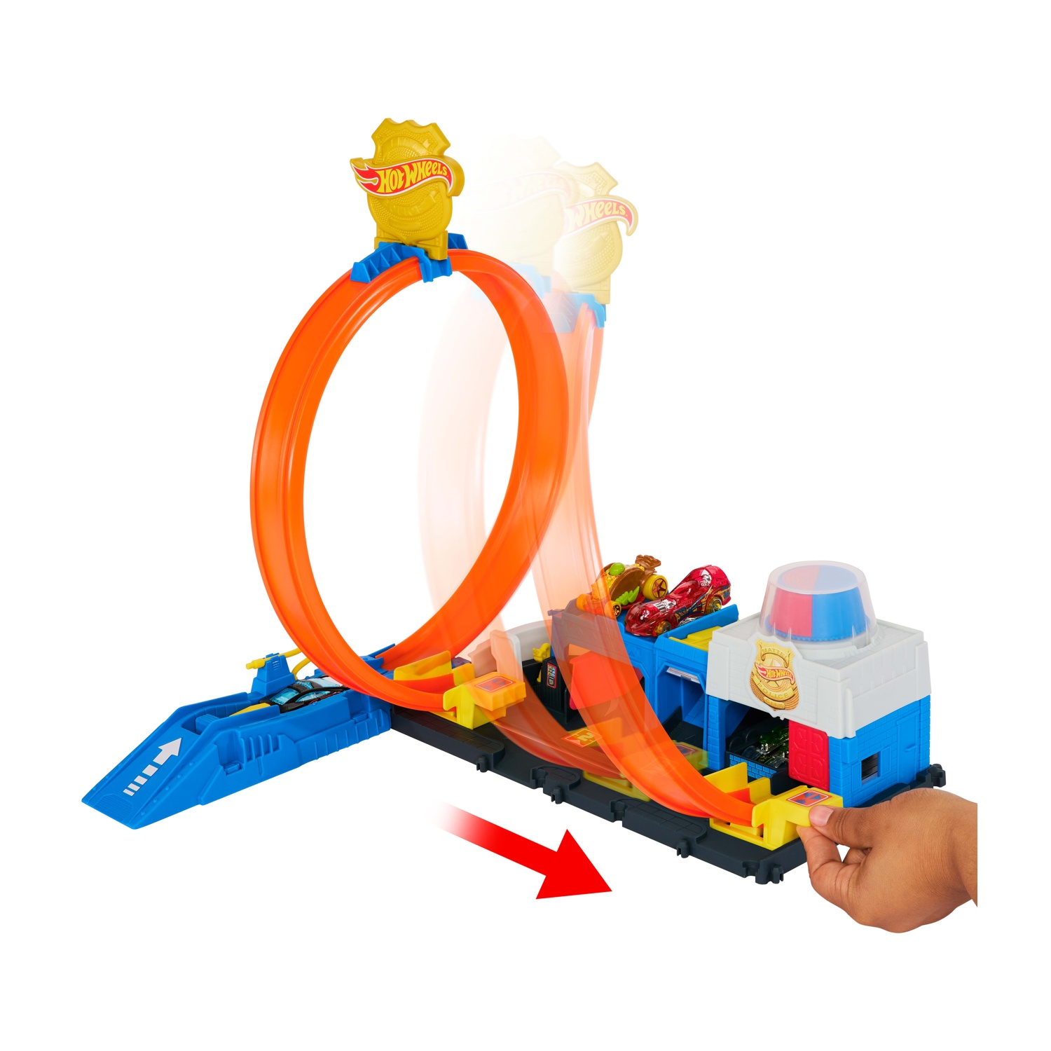 Set pista Hot Wheels con loop, auto e garage. Include un loop arancione, una rampa di lancio blu e una stazione di polizia.