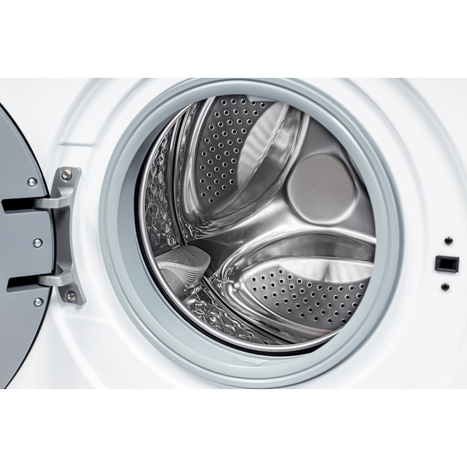 Open white washing machine door. Inside, a stainless steel drum with holes. Gray door frame and hinges visible.