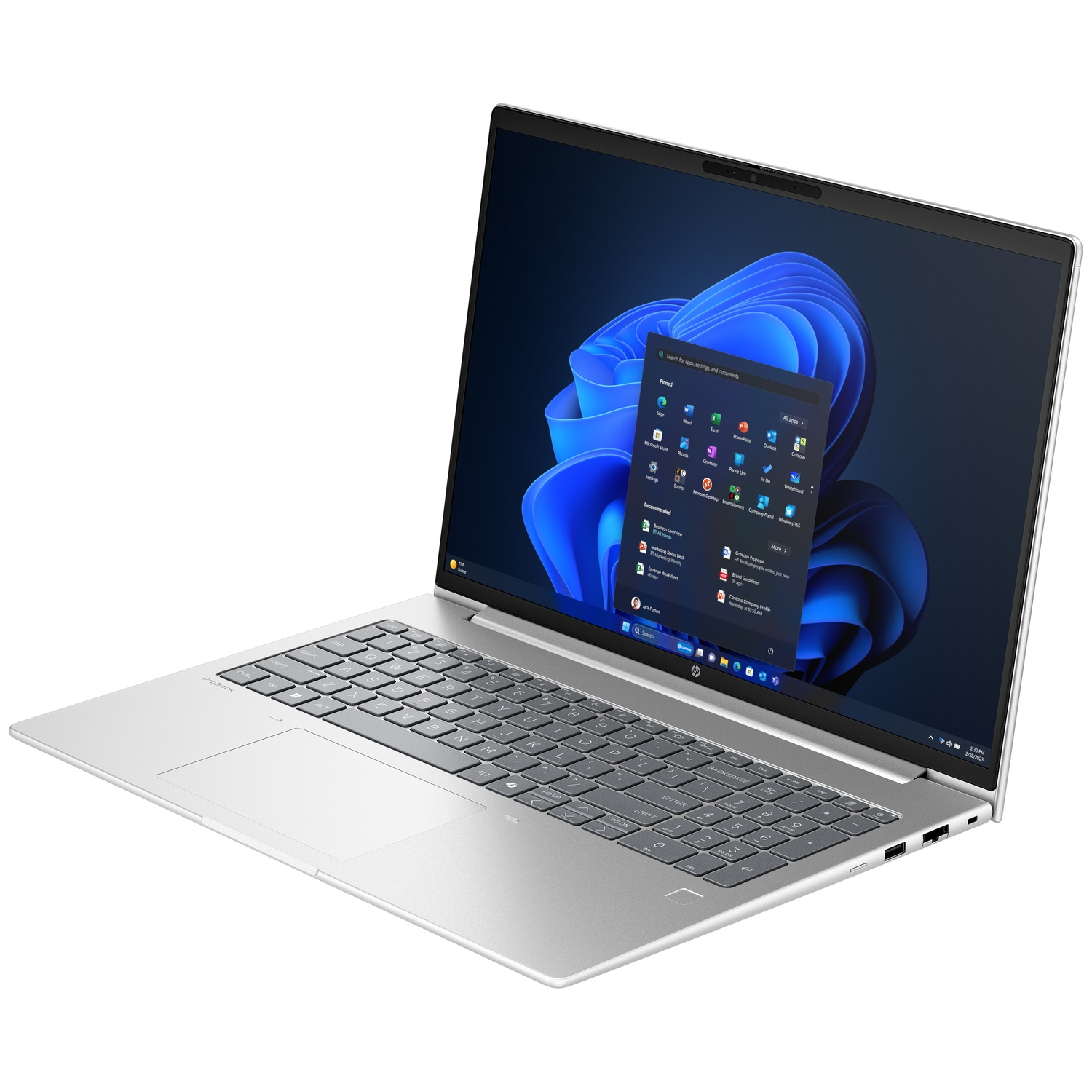Silver HP laptop open, displaying Windows 11 interface. Keyboard visible, screen showing app icons and blue background.