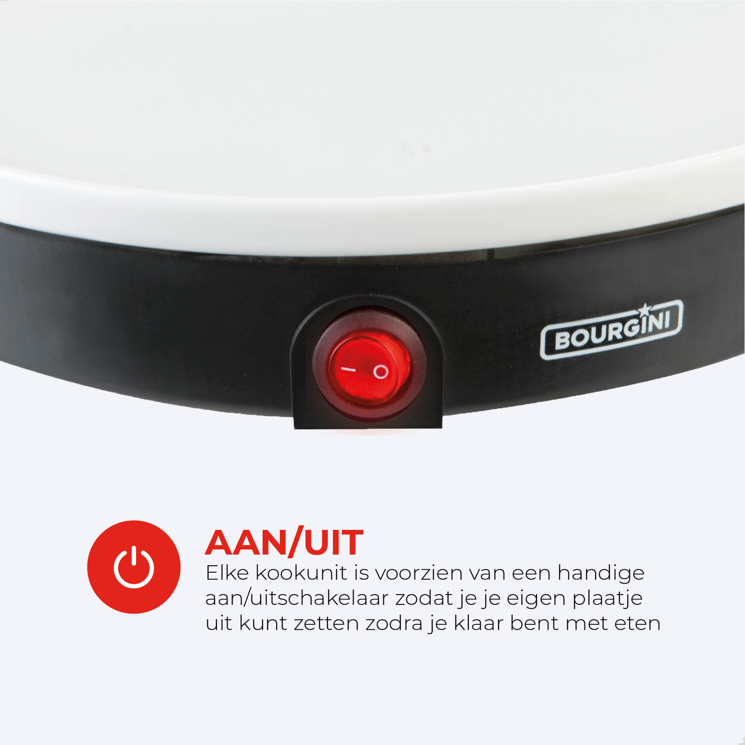 Close-up van een keukenapparaat met een rode aan/uit-knop. Het apparaat heeft een zwarte basis en een wit kookoppervlak.