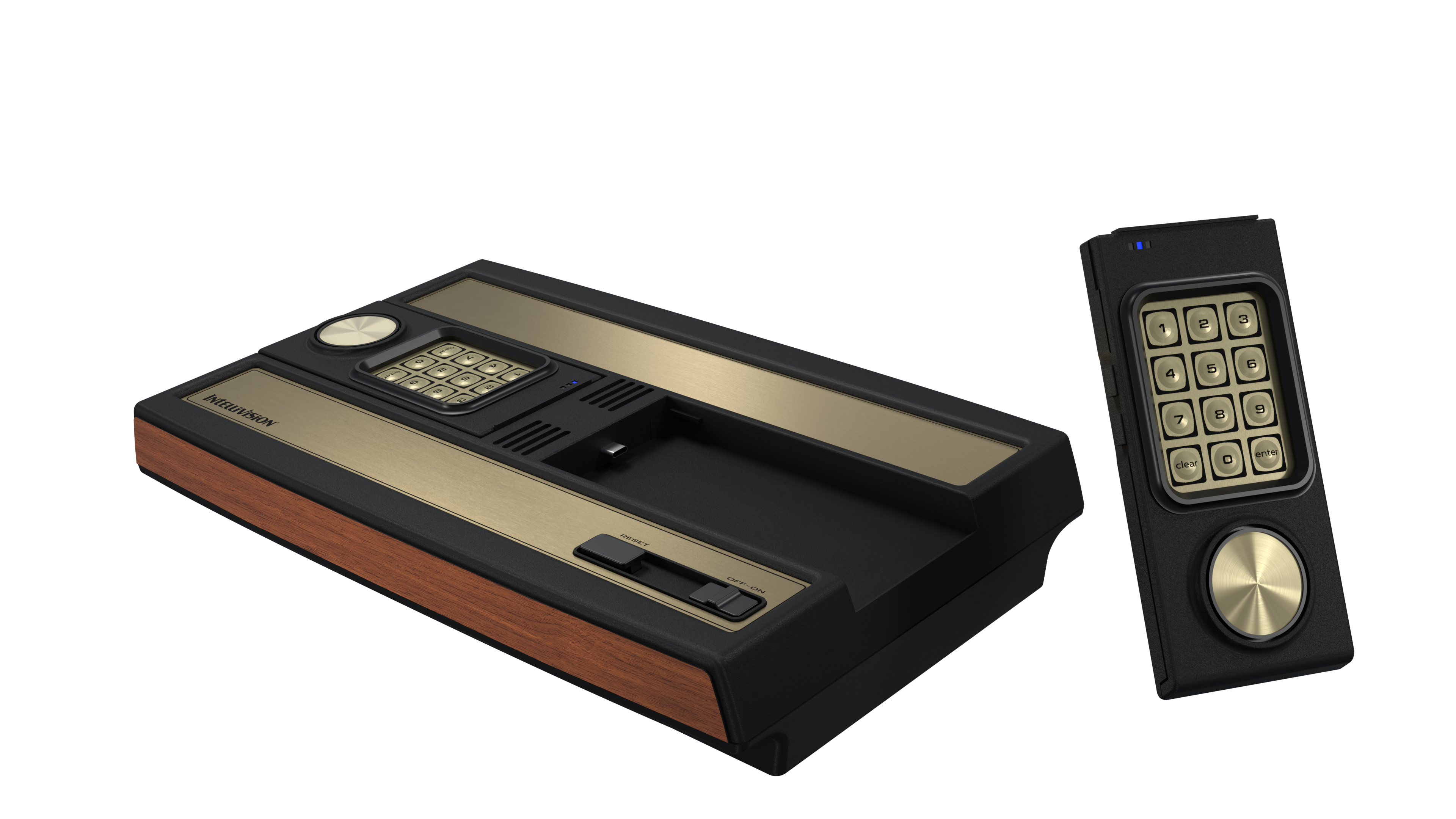 Eine Intellivision-Spielkonsole und ein Controller. Die Konsole ist schwarz und goldfarben. Der Controller hat einen Tastenblock und eine Richtungsscheibe.