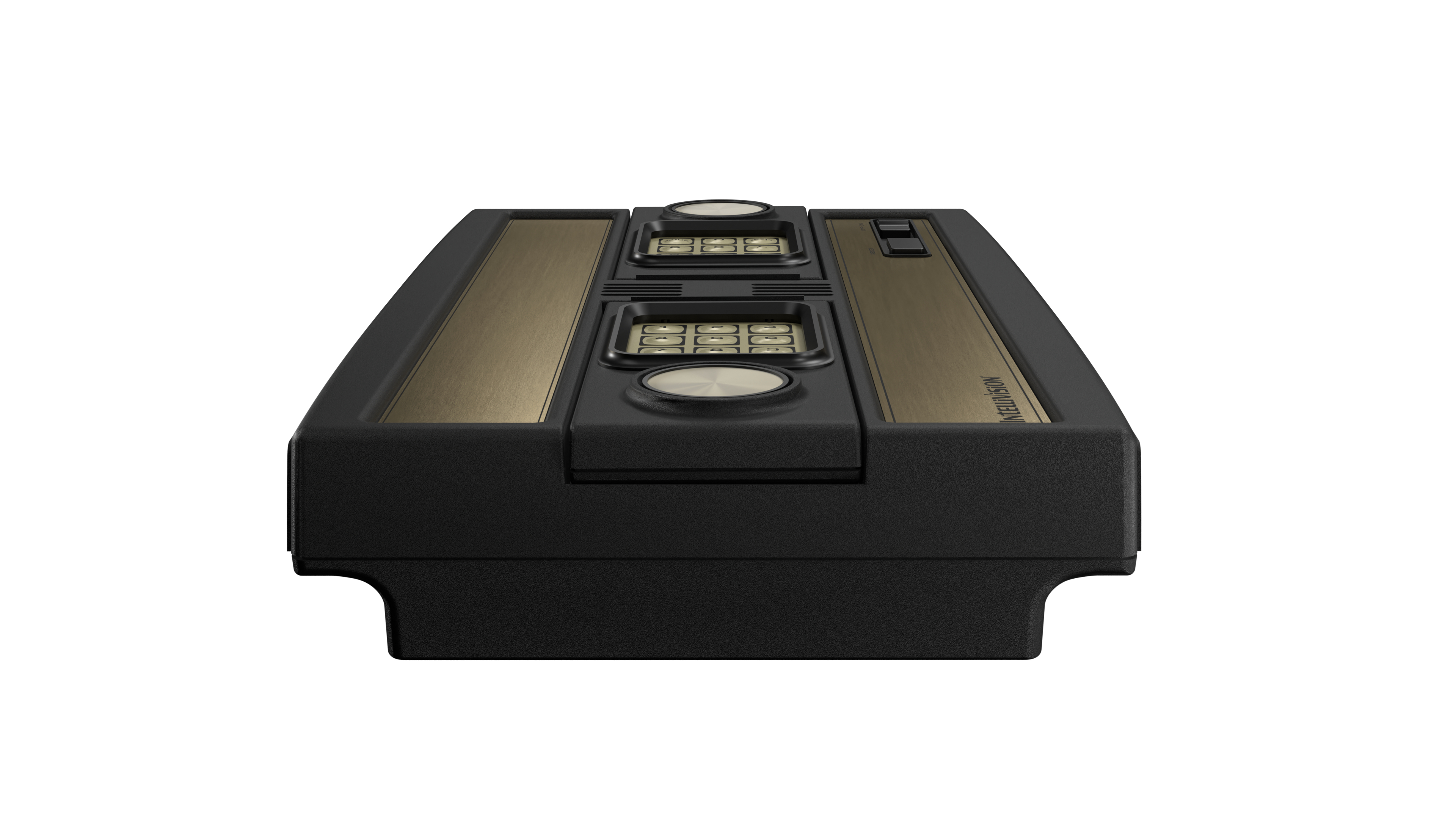 Eine schwarze Intellivision-Konsole. Sie hat goldfarbene Akzente, Tastenfelder und Tasten. Der Text 'INTELLIVISION' ist sichtbar.